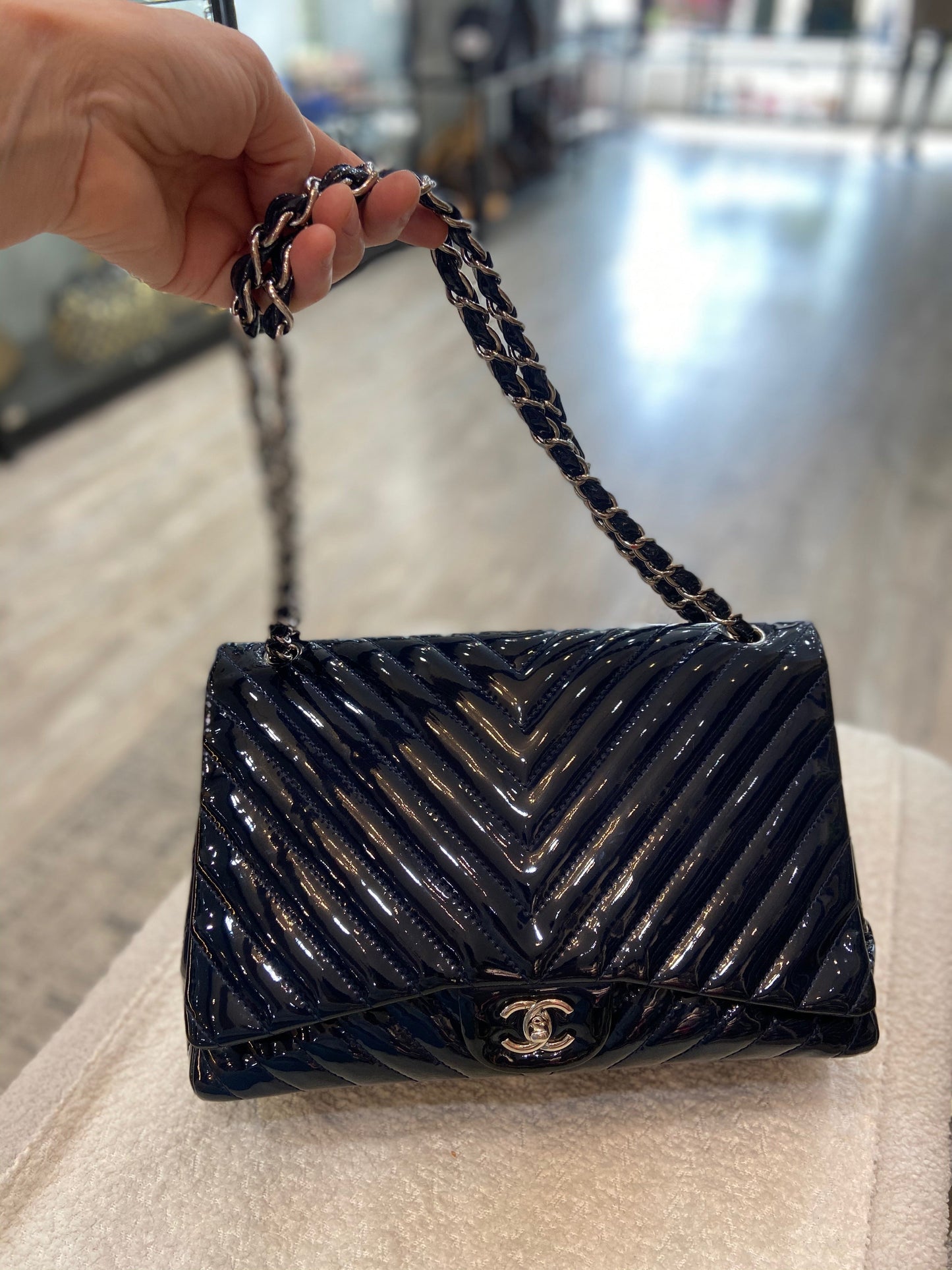 CHANEL PATENT CHEVRON QUILTED MAXI CLASSIC FLAP BAG