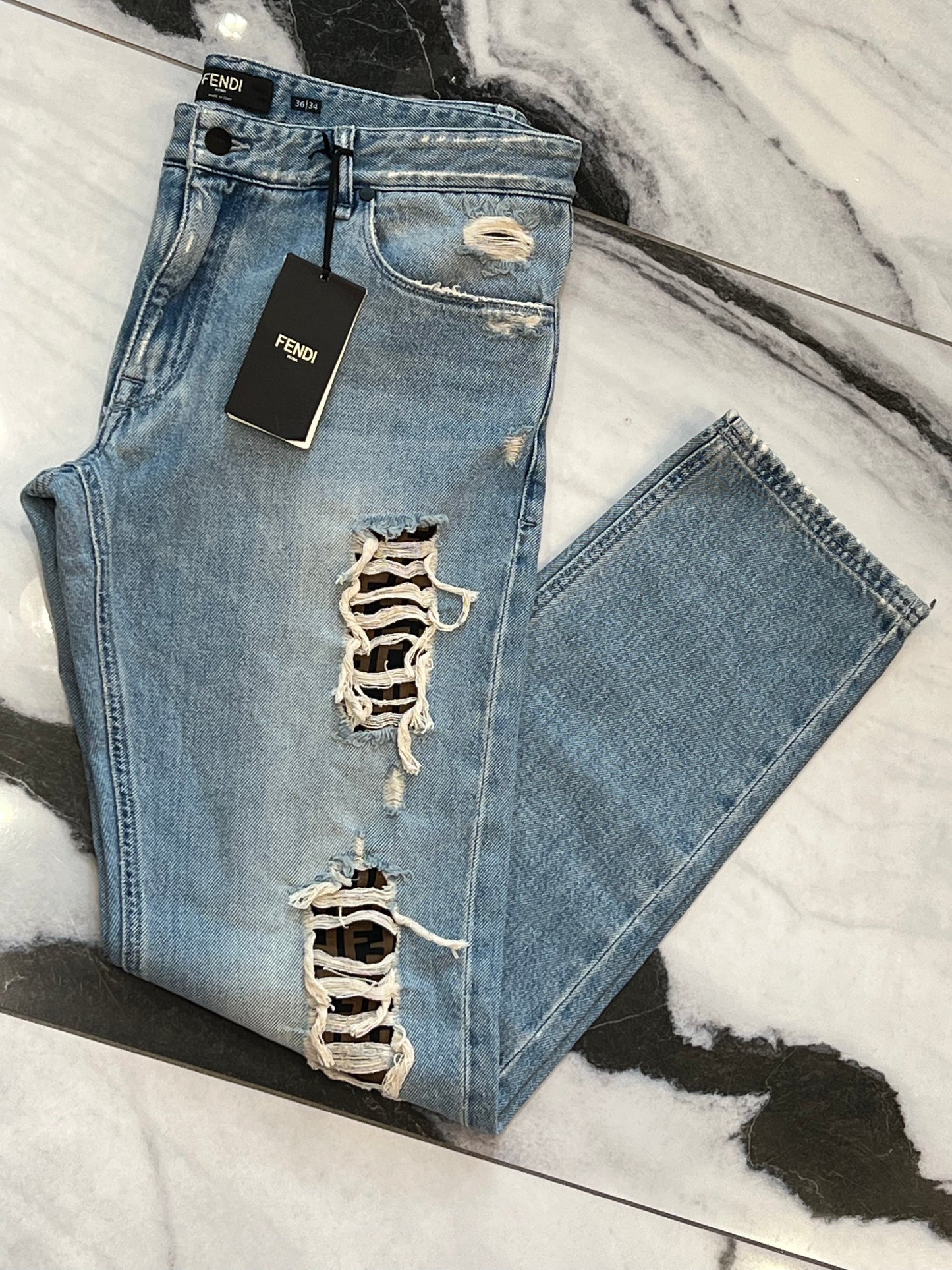 FENDI DISTRESSED FF LOGO JEANS