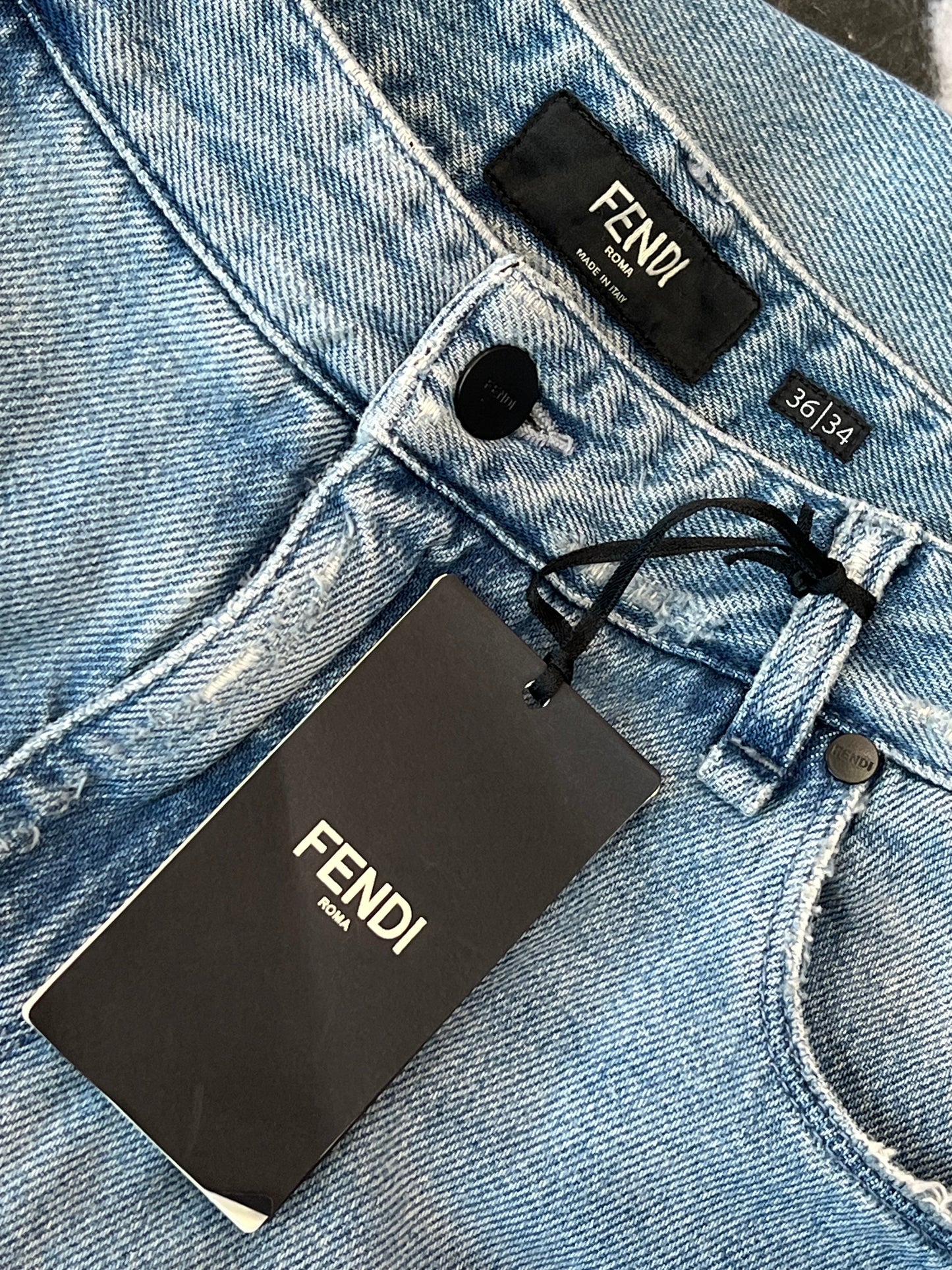 FENDI DISTRESSED FF LOGO JEANS