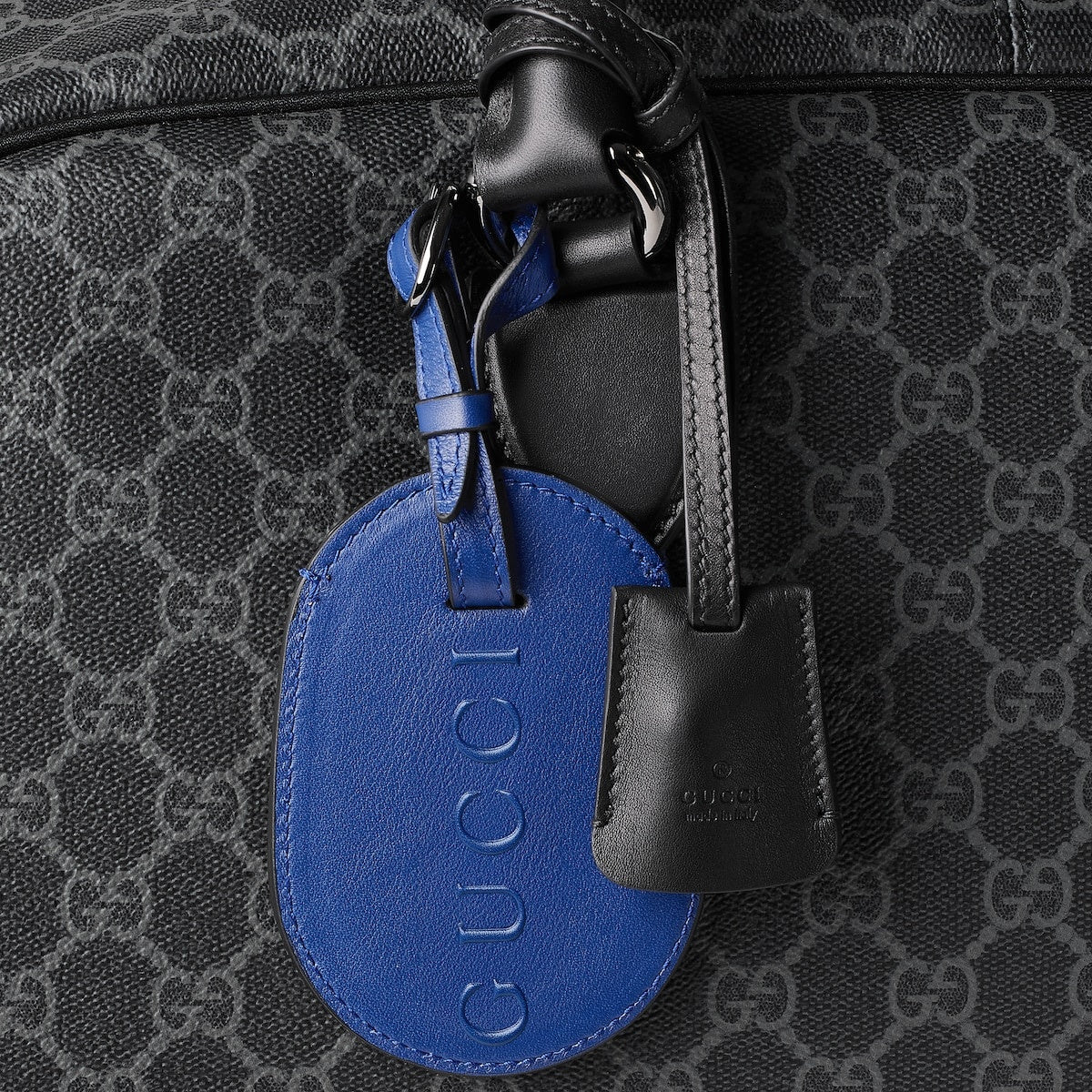 GUCCI GG EMBLEM MEDIUM DUFFLE BAG