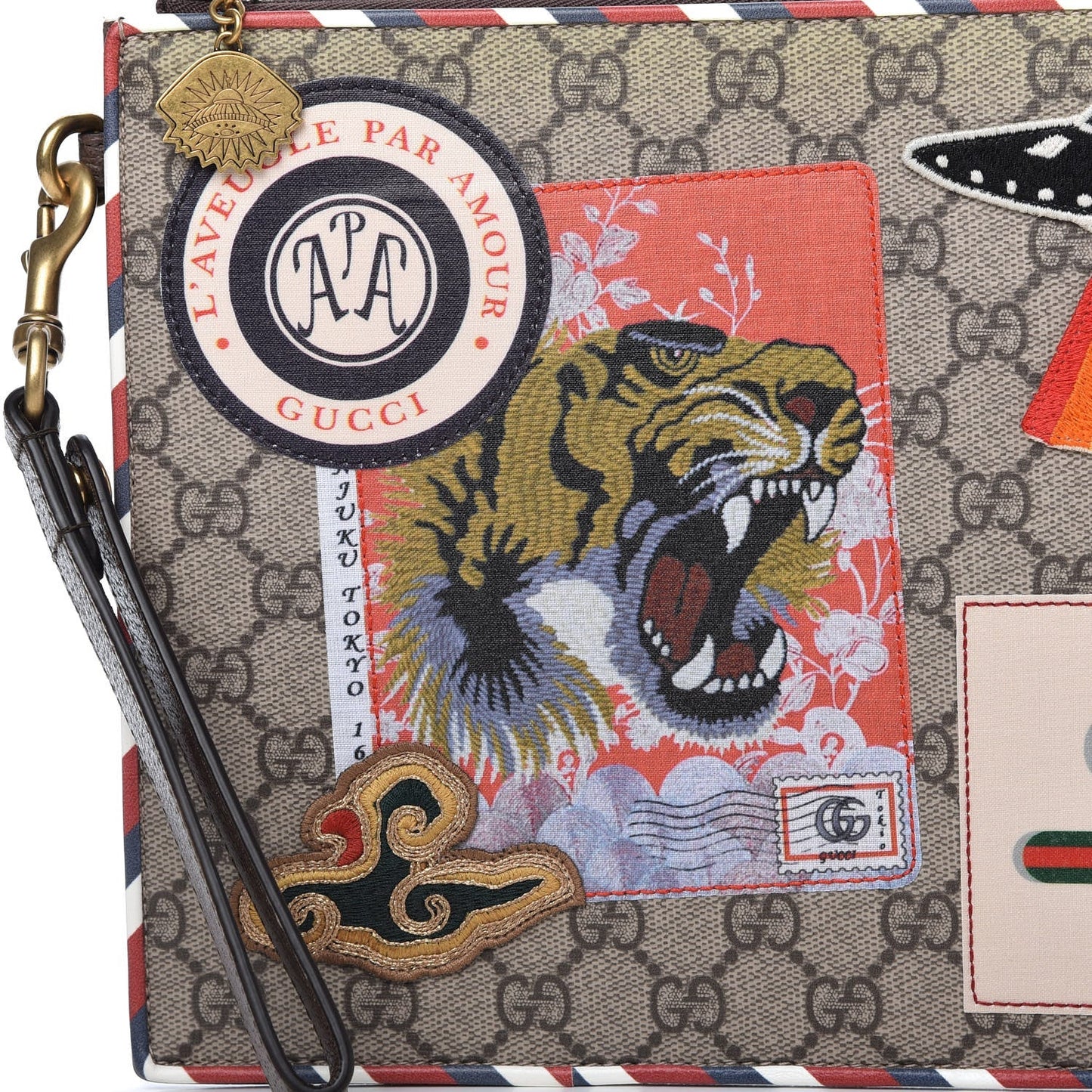 GUCCI GG SUPREME COURIER CLUTCH BAG