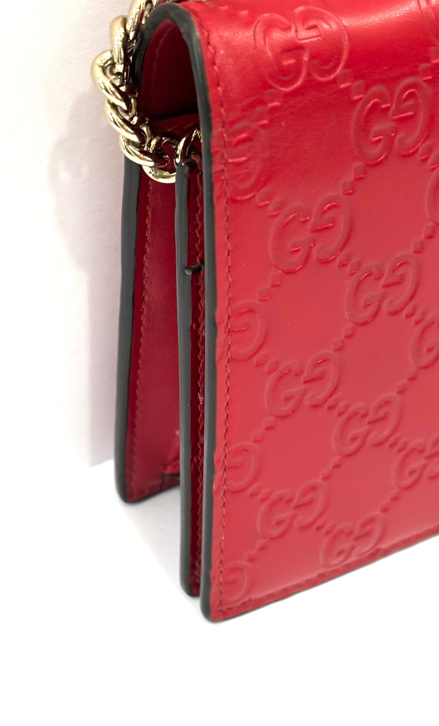 GUCCI GUCCISSIMA LEATHER SIGNATURE BOW WALLET ON CHAIN