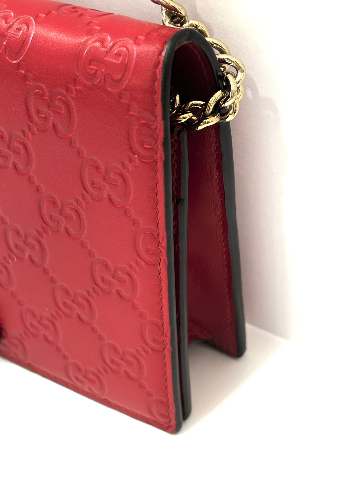 GUCCI GUCCISSIMA LEATHER SIGNATURE BOW WALLET ON CHAIN
