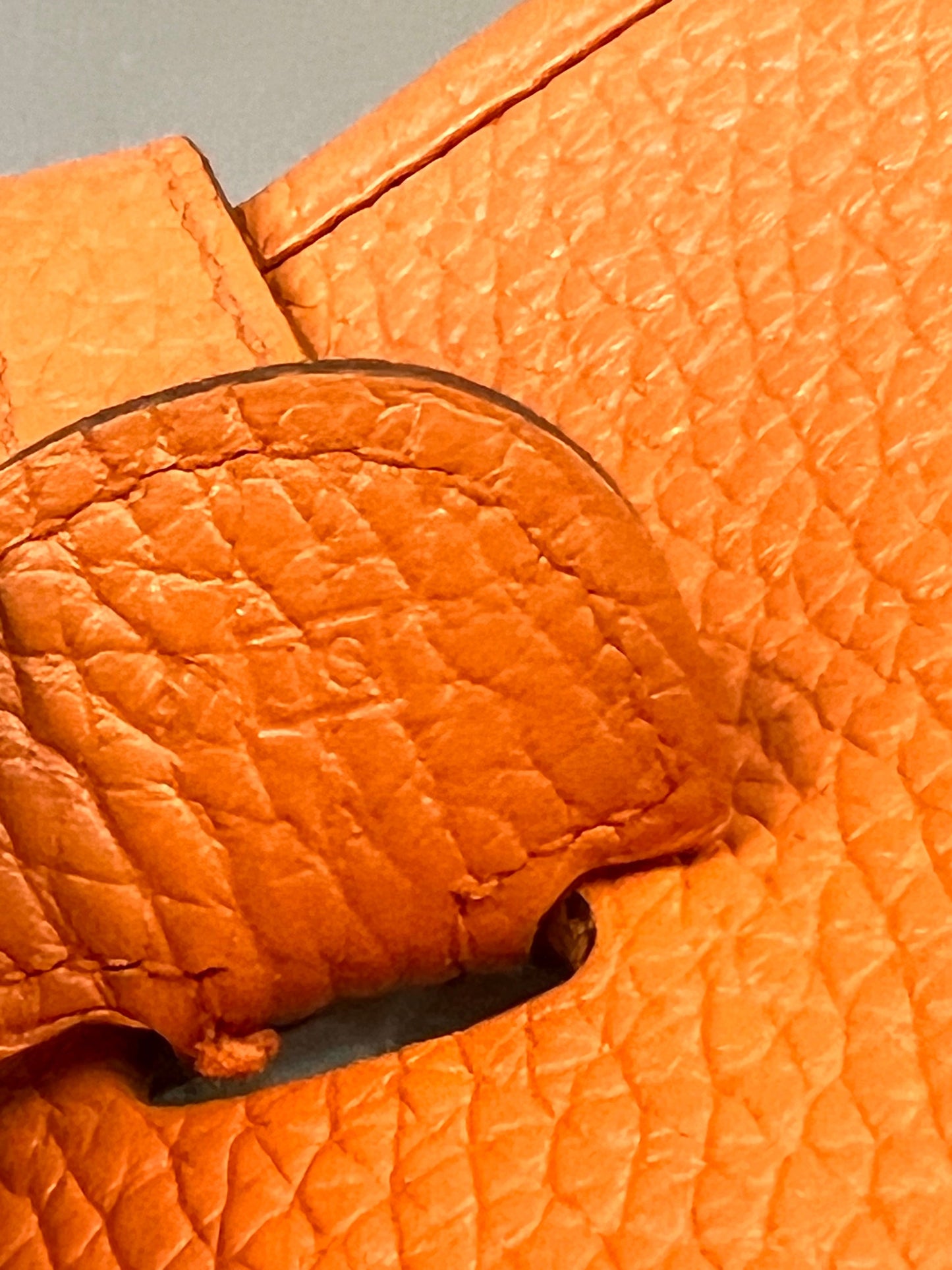 HERMÈS EVELYNE III PM CLEMENCE SHOULDER BAG IN ORANGE