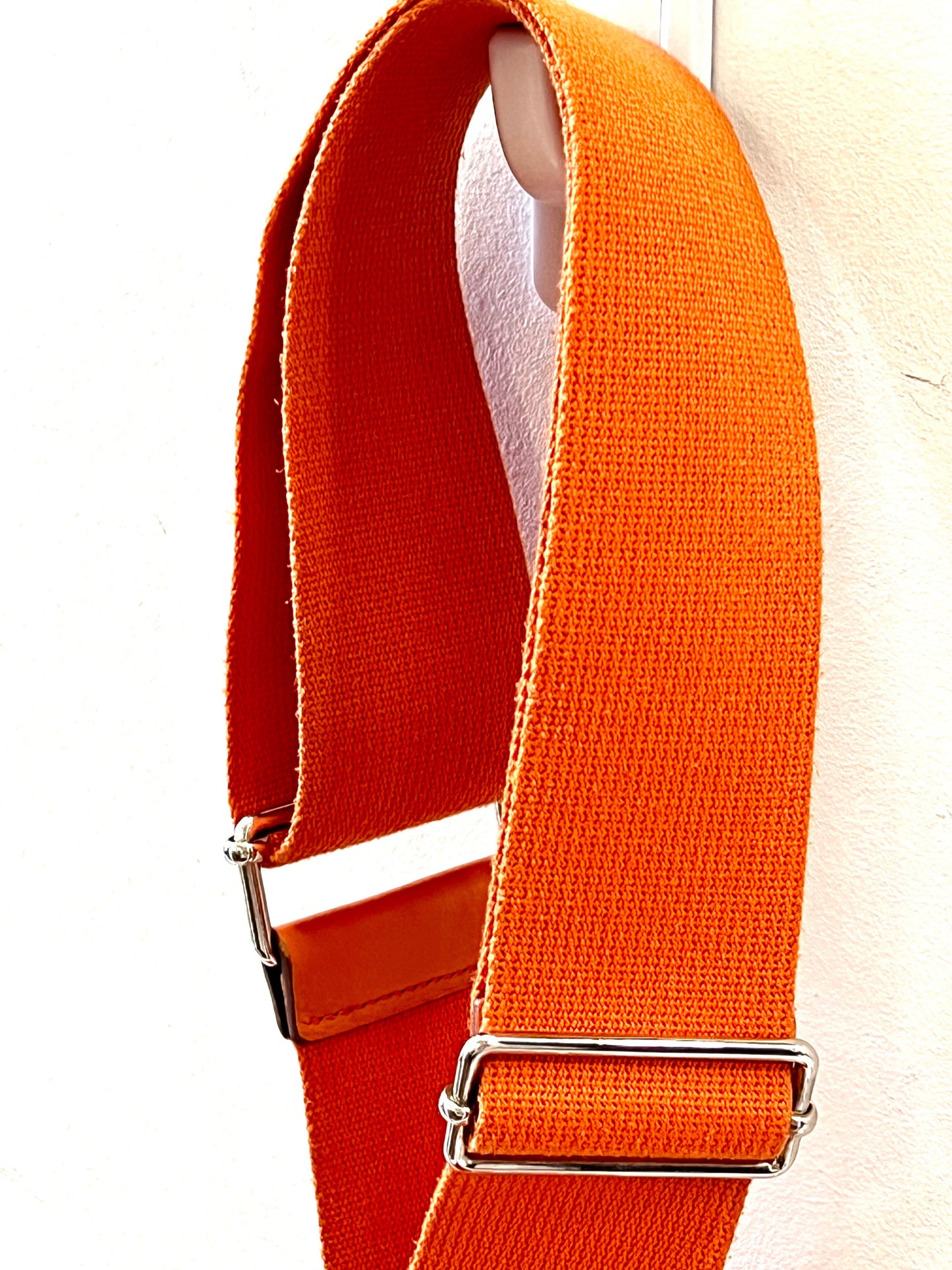 HERMÈS EVELYNE III PM CLEMENCE SHOULDER BAG IN ORANGE