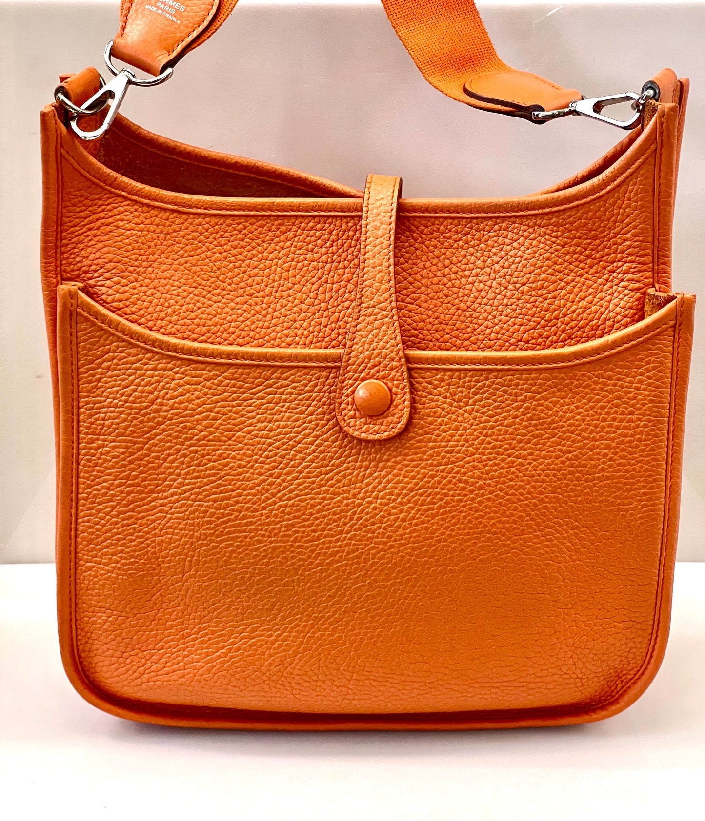 HERMÈS EVELYNE III PM CLEMENCE SHOULDER BAG IN ORANGE