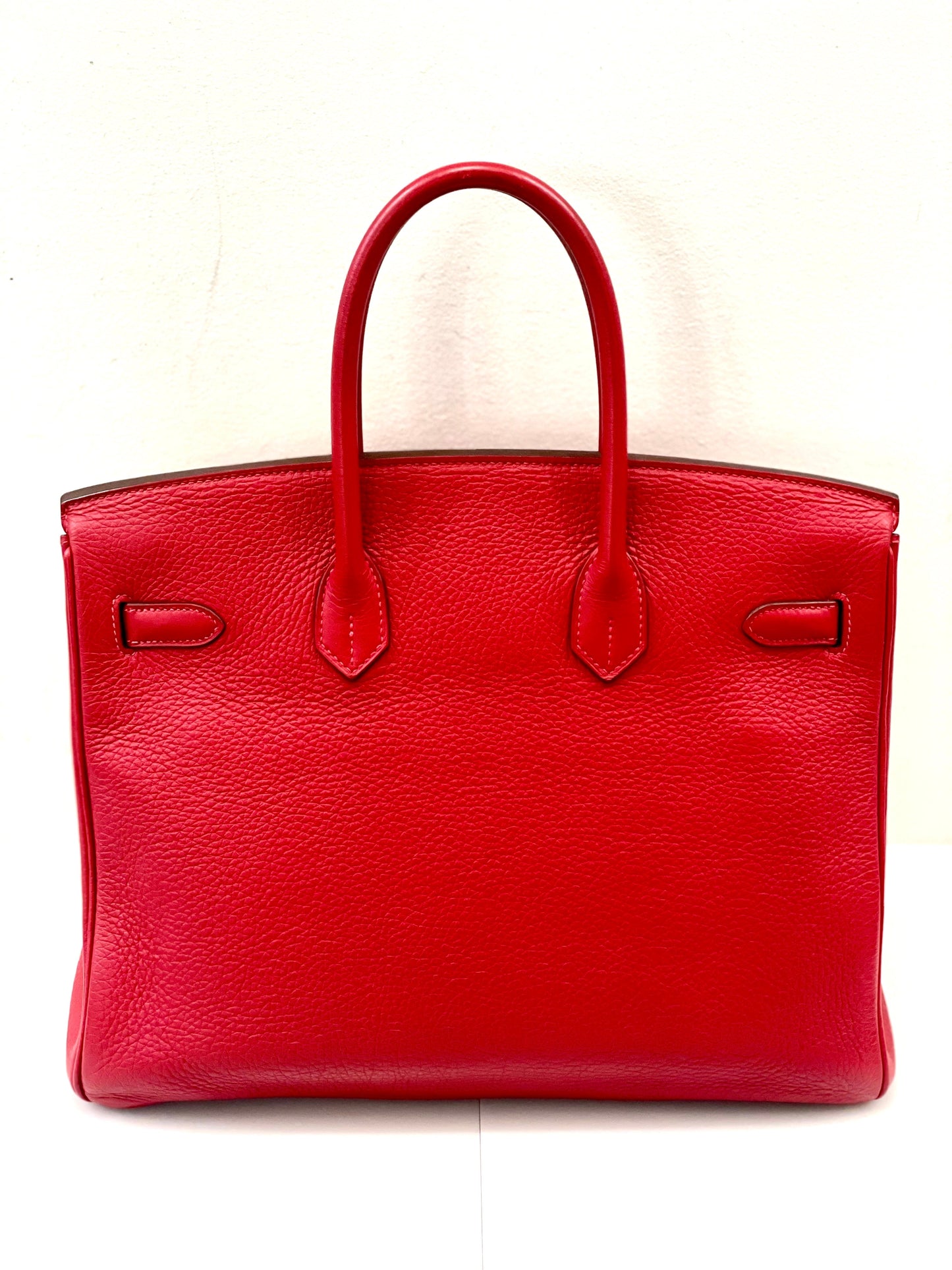 HERMÈS BIRKIN 35 RUBY CLEMENCE HANDBAG