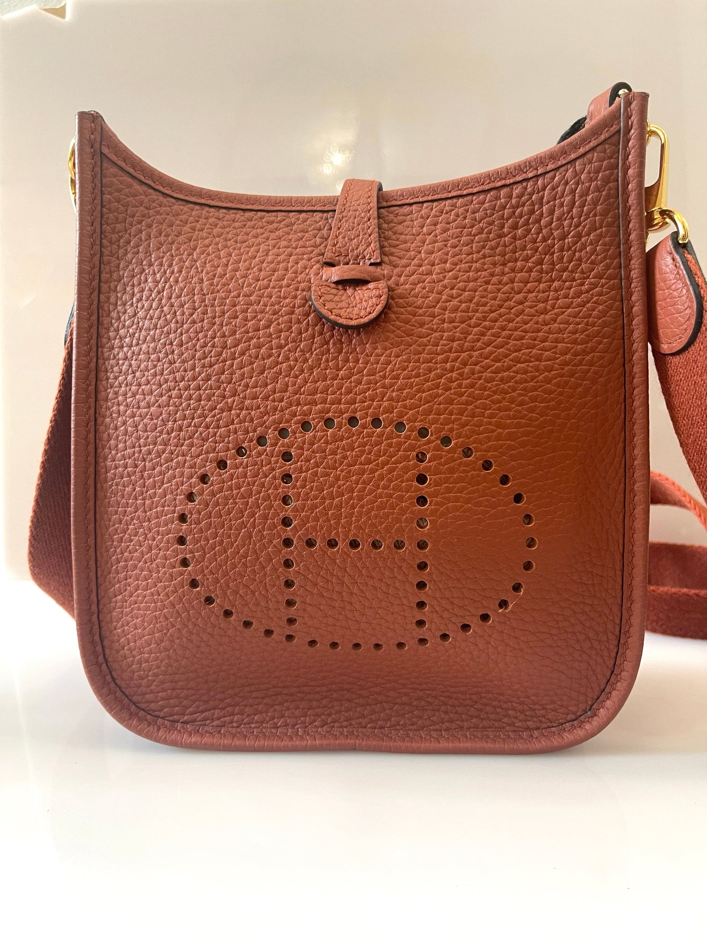 HERMÈS CLEMENCE MINI EVELYN TPM CROSSBODY BAG IN ROUGE PIVOINE
