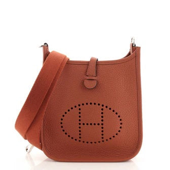 HERMÈS CLEMENCE MINI EVELYN TPM CROSSBODY BAG IN ROUGE PIVOINE