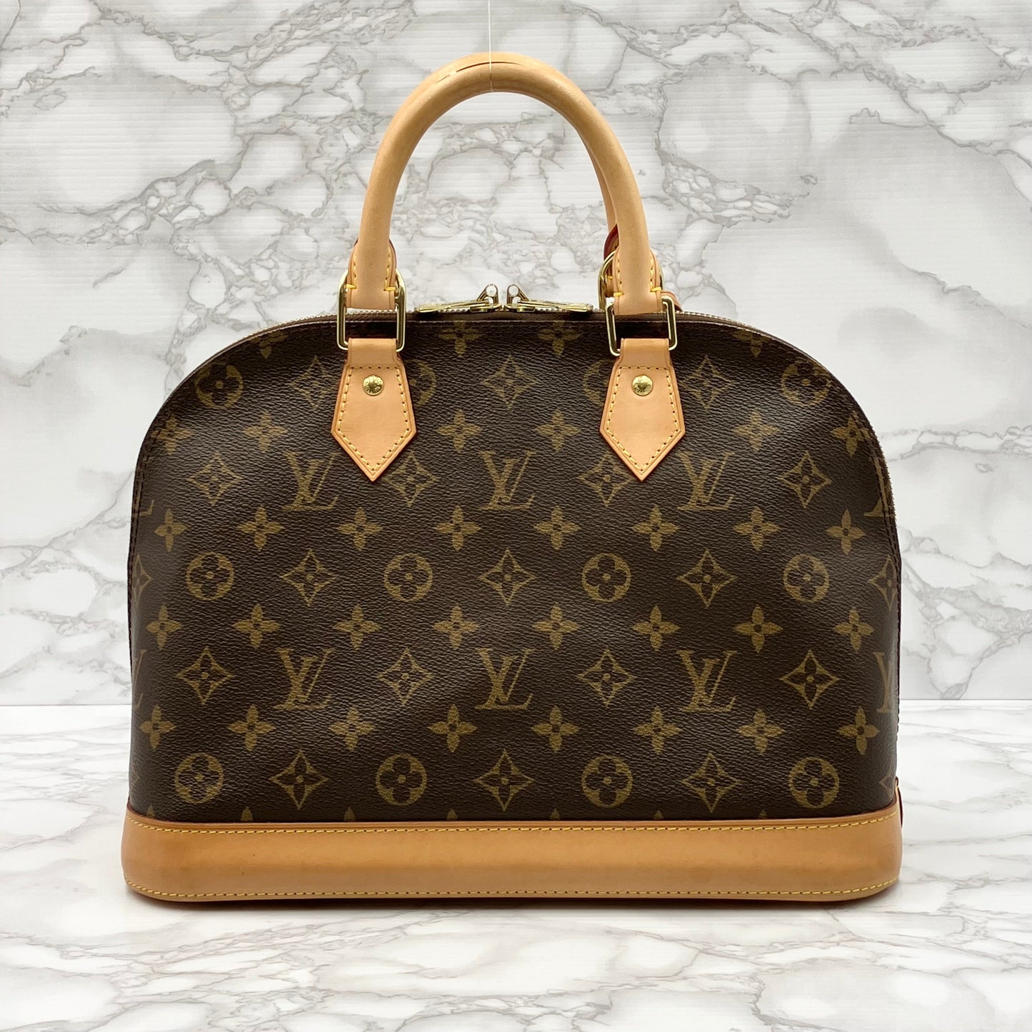 LOUIS VUITTON Monogram Alma PM Handbag
