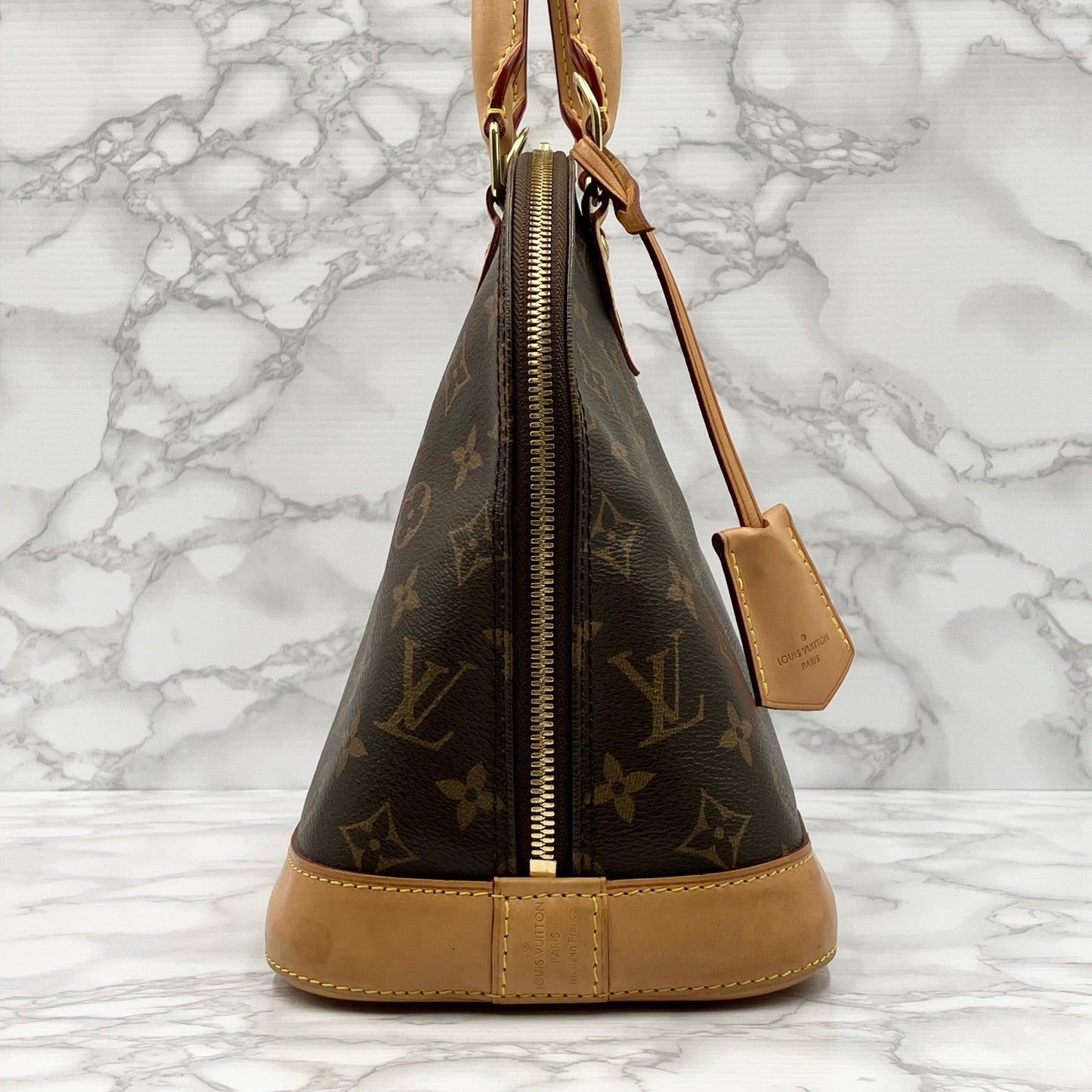 LOUIS VUITTON Monogram Alma PM Handbag