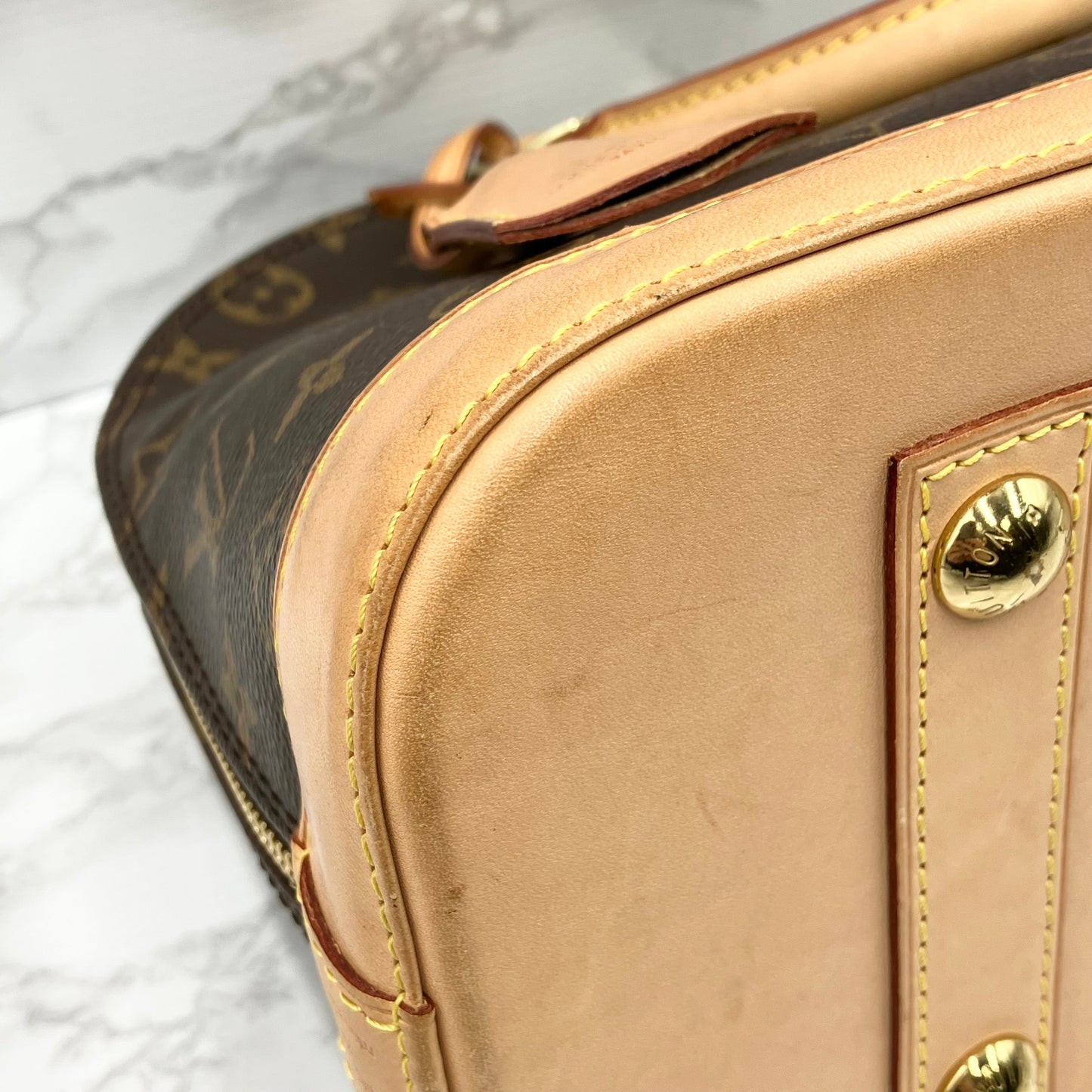 LOUIS VUITTON Monogram Alma PM Handbag