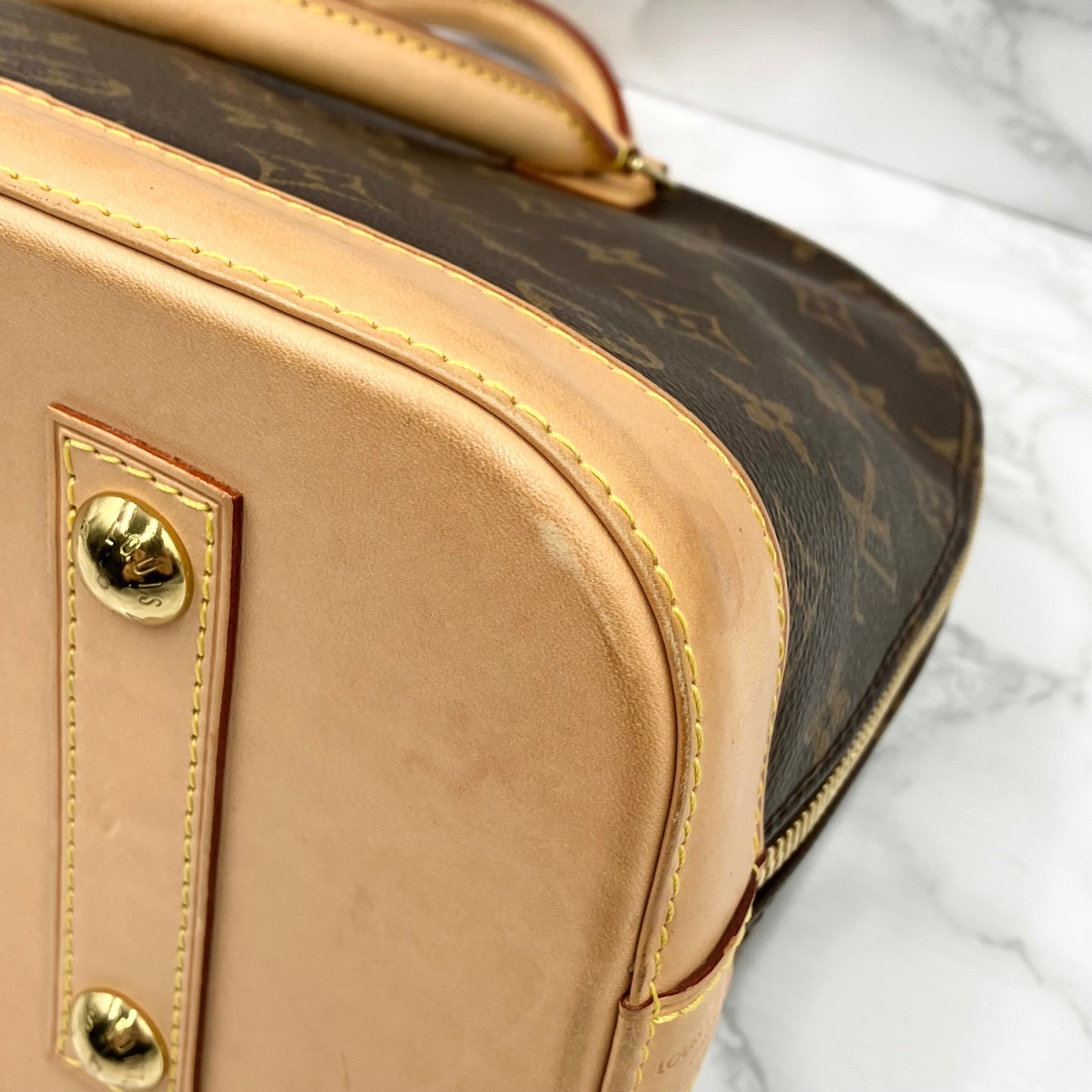 LOUIS VUITTON Monogram Alma PM Handbag