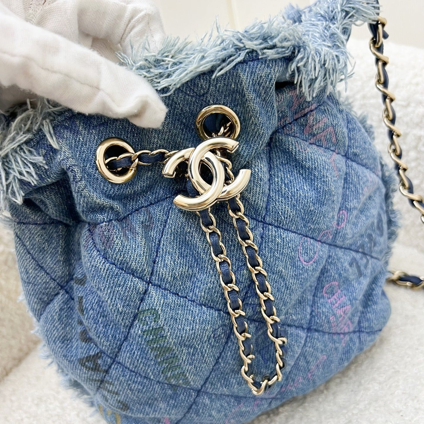 GLM-22P Denim Mood Mini Drawstring Bucket Bag in Blue Printed Denim and LGHW