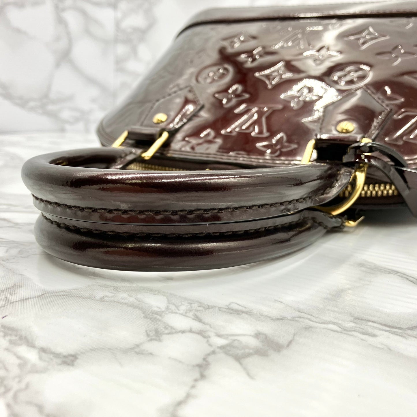 LOUIS VUITTON Alma BB vernis