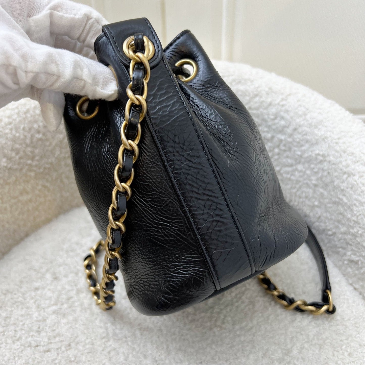 GLM-Mini Drawstring Bucket Bag in Glossy Distressed Black Calfskin and AGHW