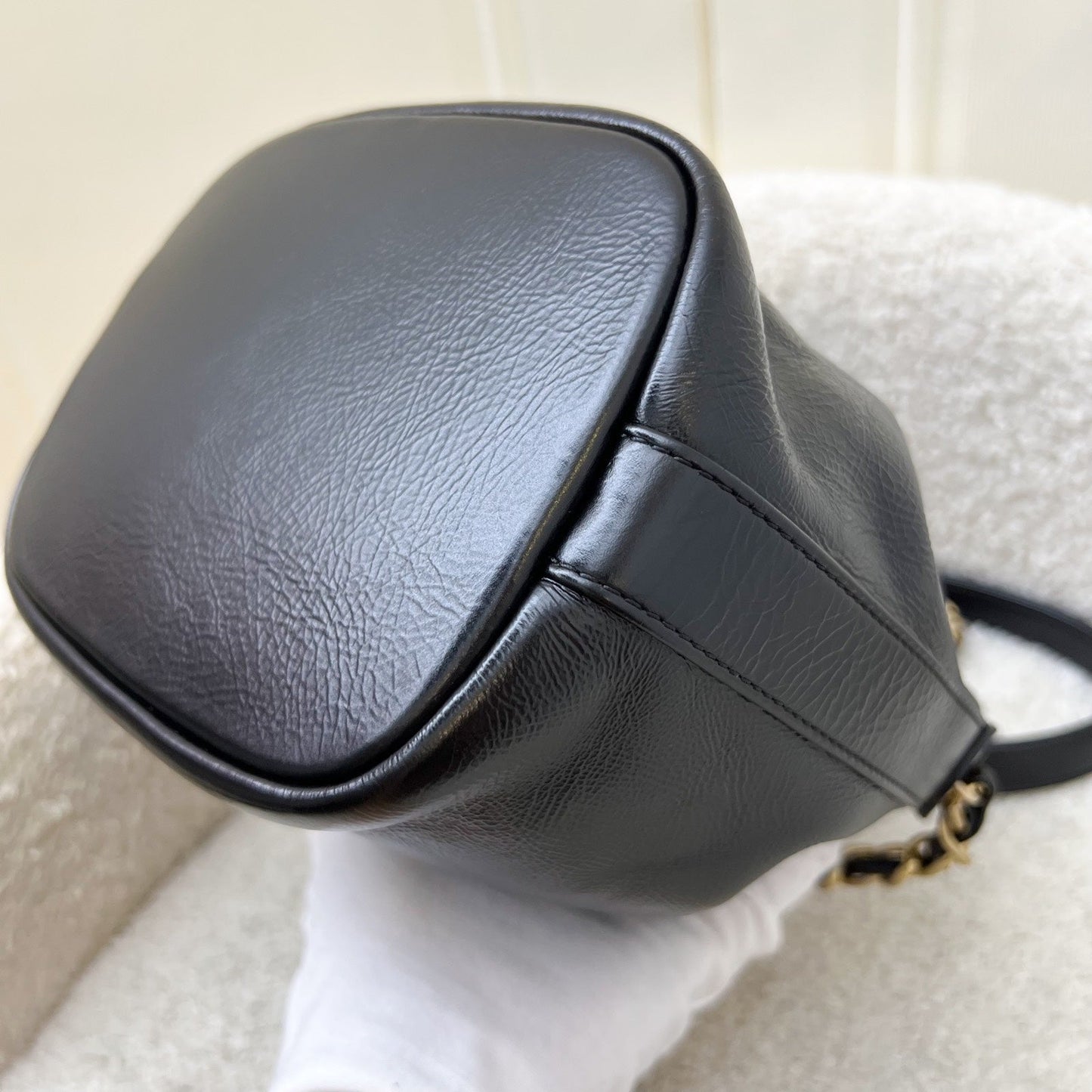 GLM-Mini Drawstring Bucket Bag in Glossy Distressed Black Calfskin and AGHW