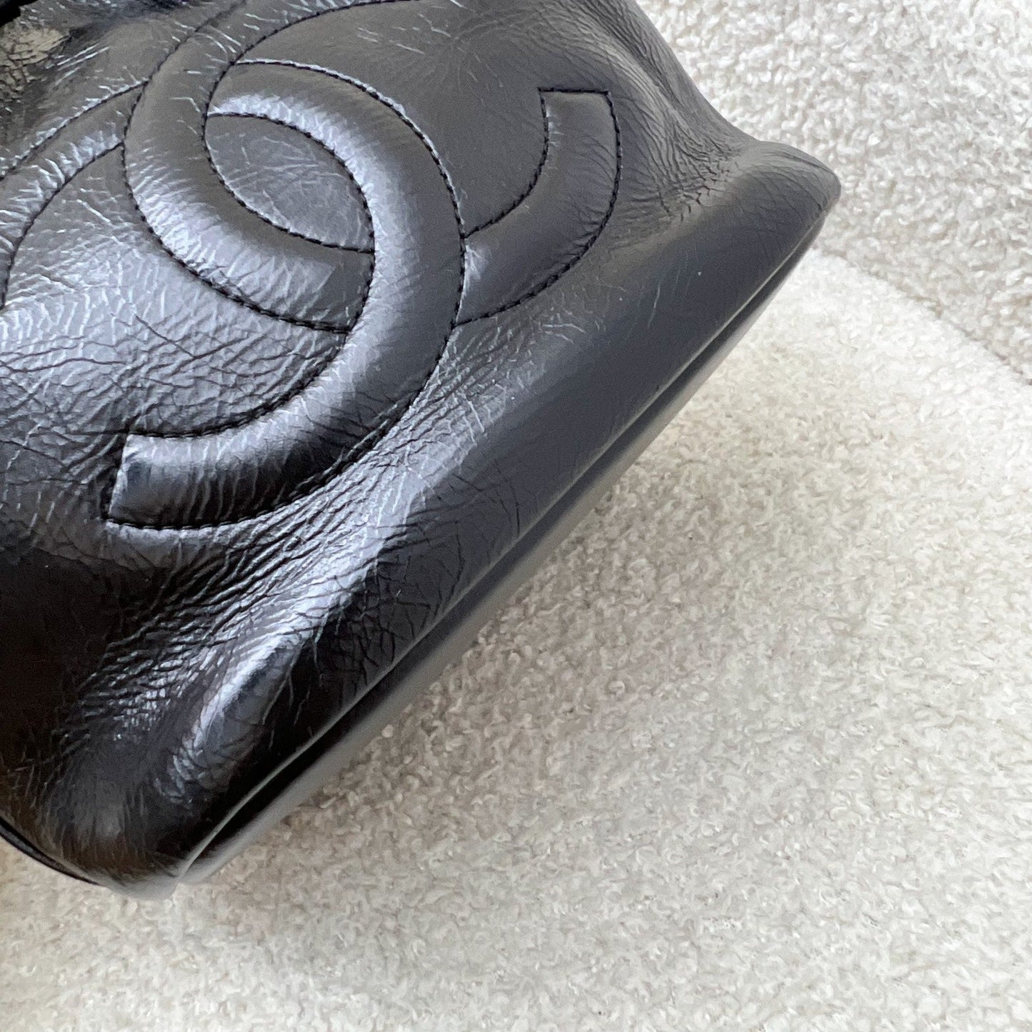 GLM-Mini Drawstring Bucket Bag in Glossy Distressed Black Calfskin and AGHW