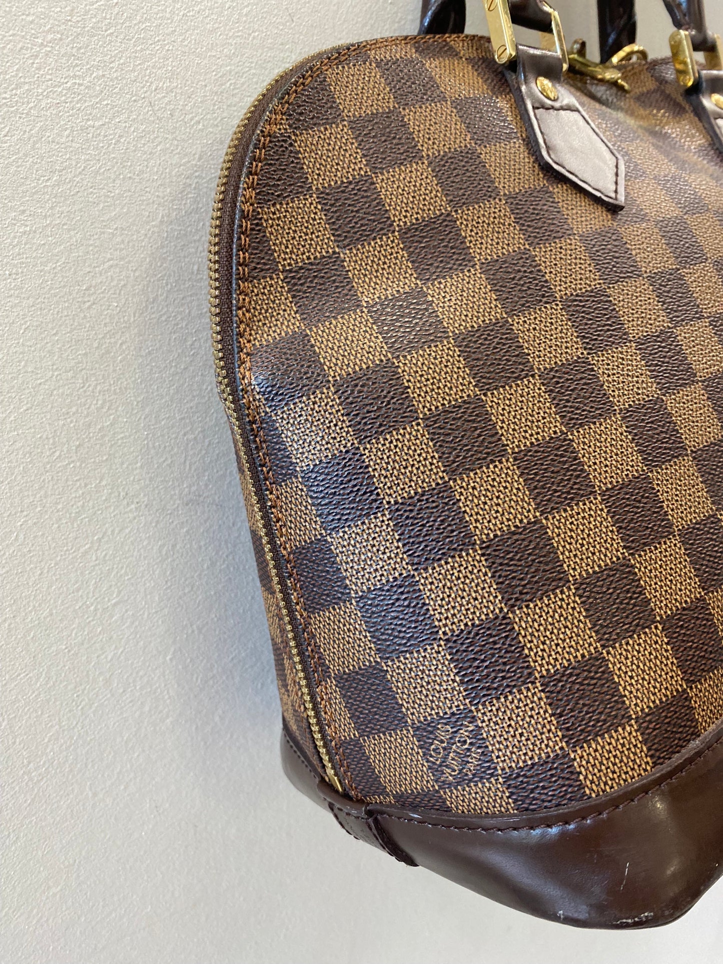 LOUIS VUITTON DAMIER EBENE ALMA PM HANDBAG