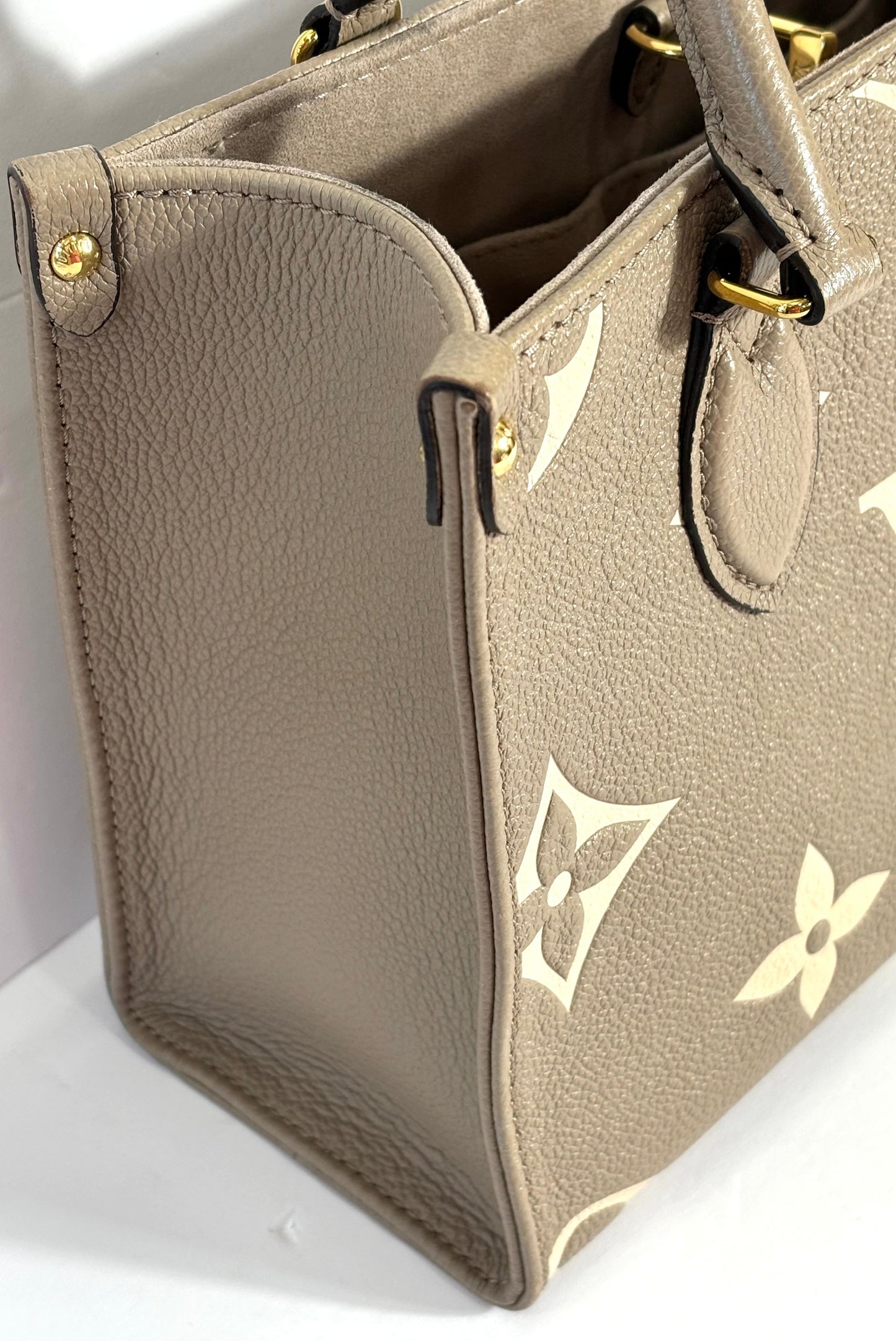 LV EMPREINTE LEATHER BI-COLOR ONTHEGO PM TOTE BAG