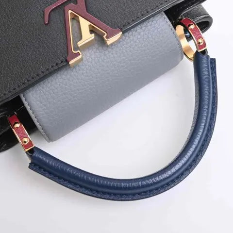 LOUIS VUITTON CAPUCINES TAURILLON  LEATHER PM TRI-COLOR HANDBAG