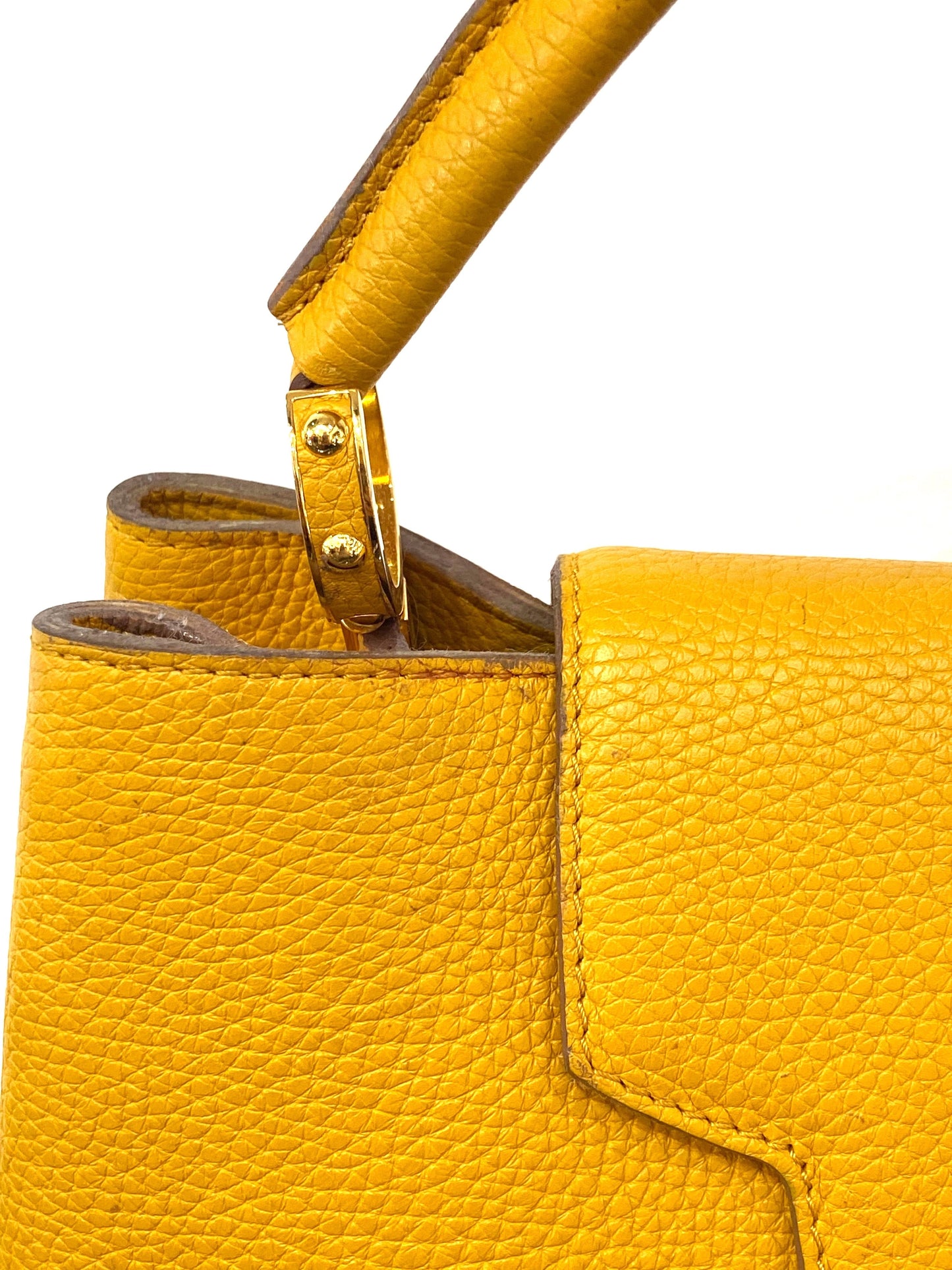 LOUIS VUITTON TAURILLON CAPUCINES MM HANDBAG TOURENESOL