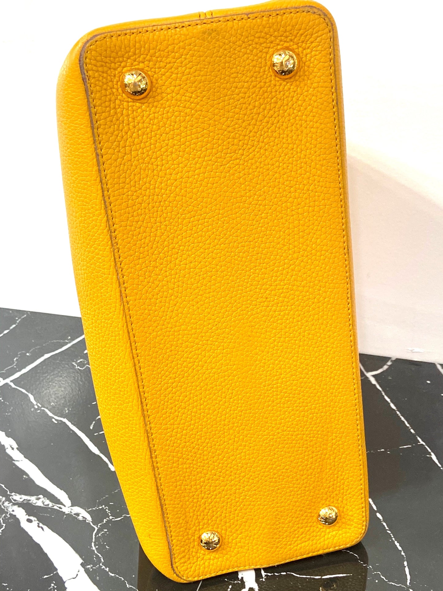 LOUIS VUITTON TAURILLON CAPUCINES MM HANDBAG TOURENESOL
