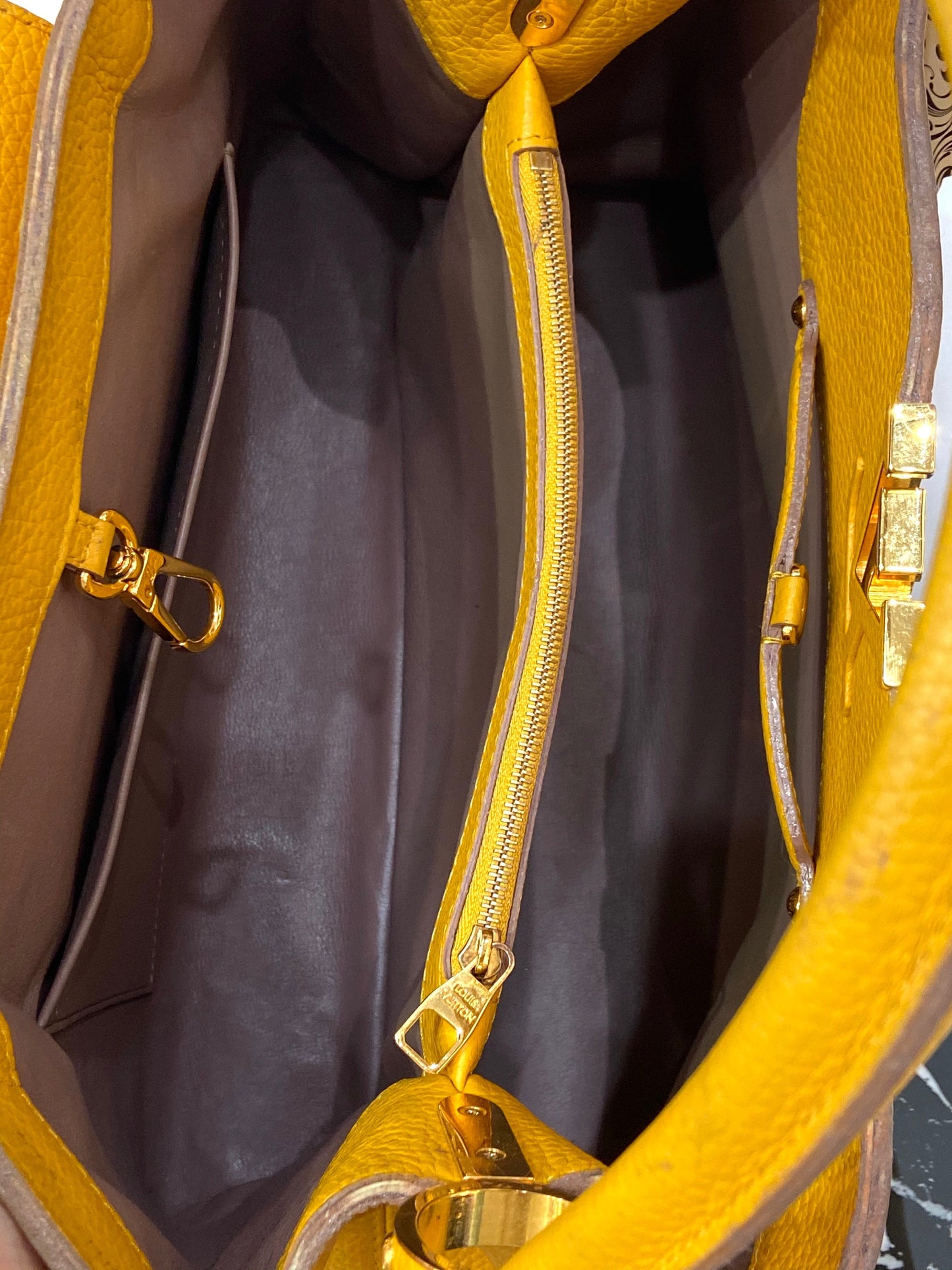 LOUIS VUITTON TAURILLON CAPUCINES MM HANDBAG TOURENESOL
