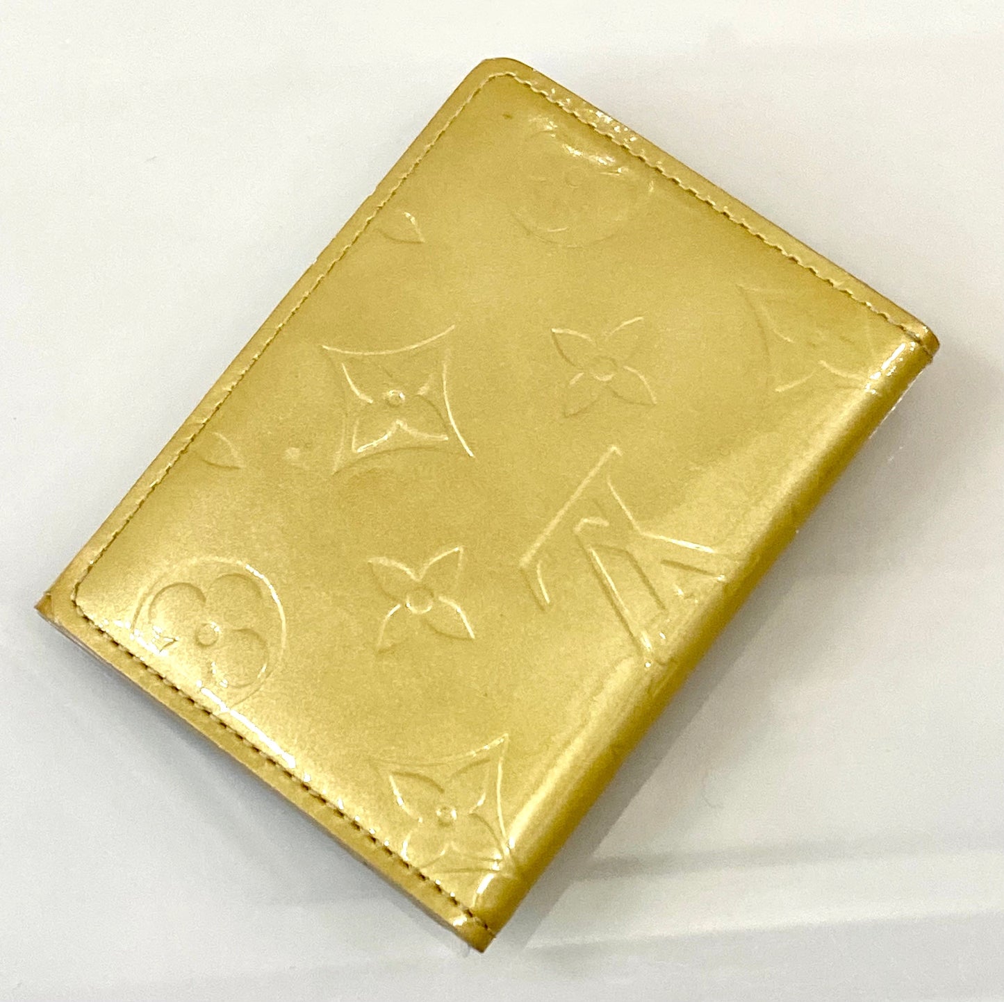 LOUIS VUITTON LUDLOW MONOGRAM EMBOSSED VENIS WALLET