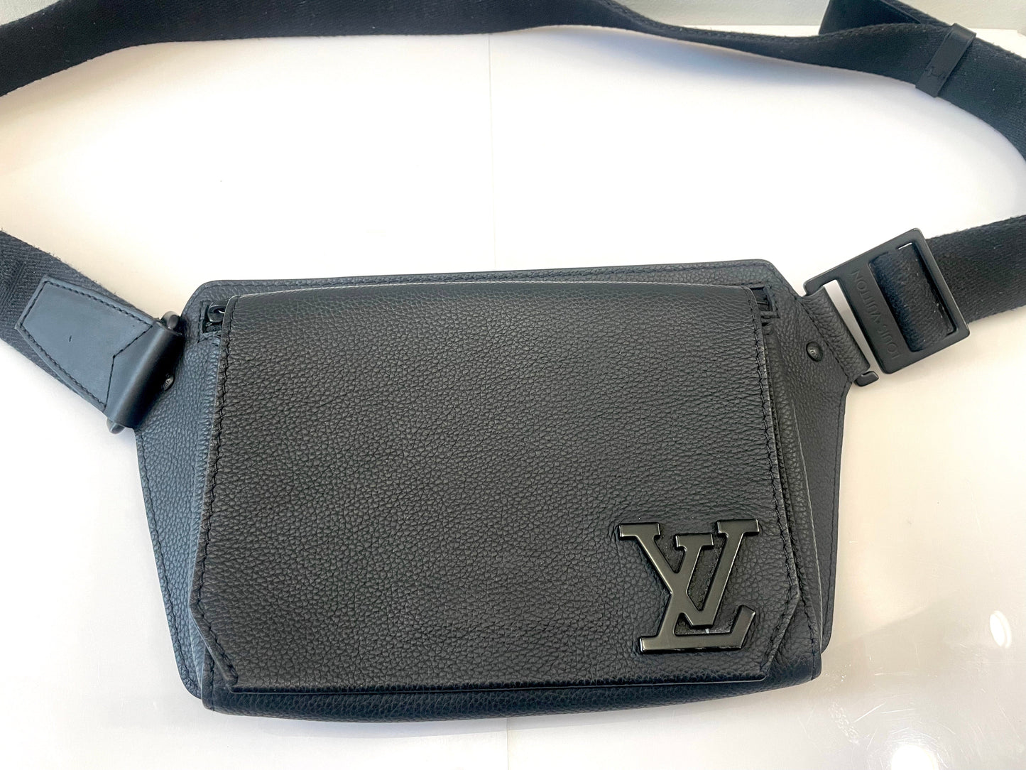 LOUIS VUITTON GRAINED CALFSKIN AEROGRAM TAKEOFF SLING BAG