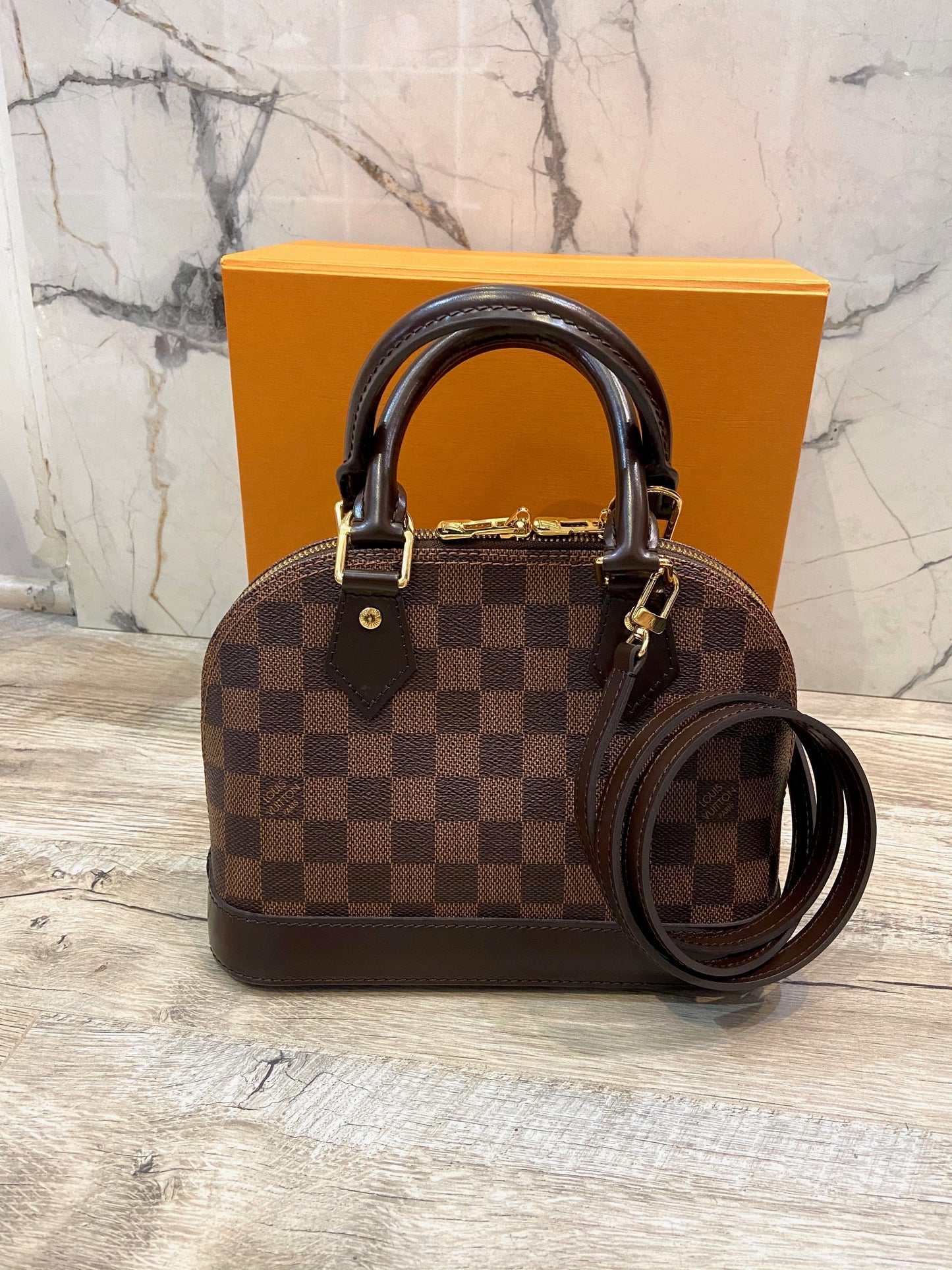 LOUIS VUITTON DAMIER EBENE ALMA BB BAG
