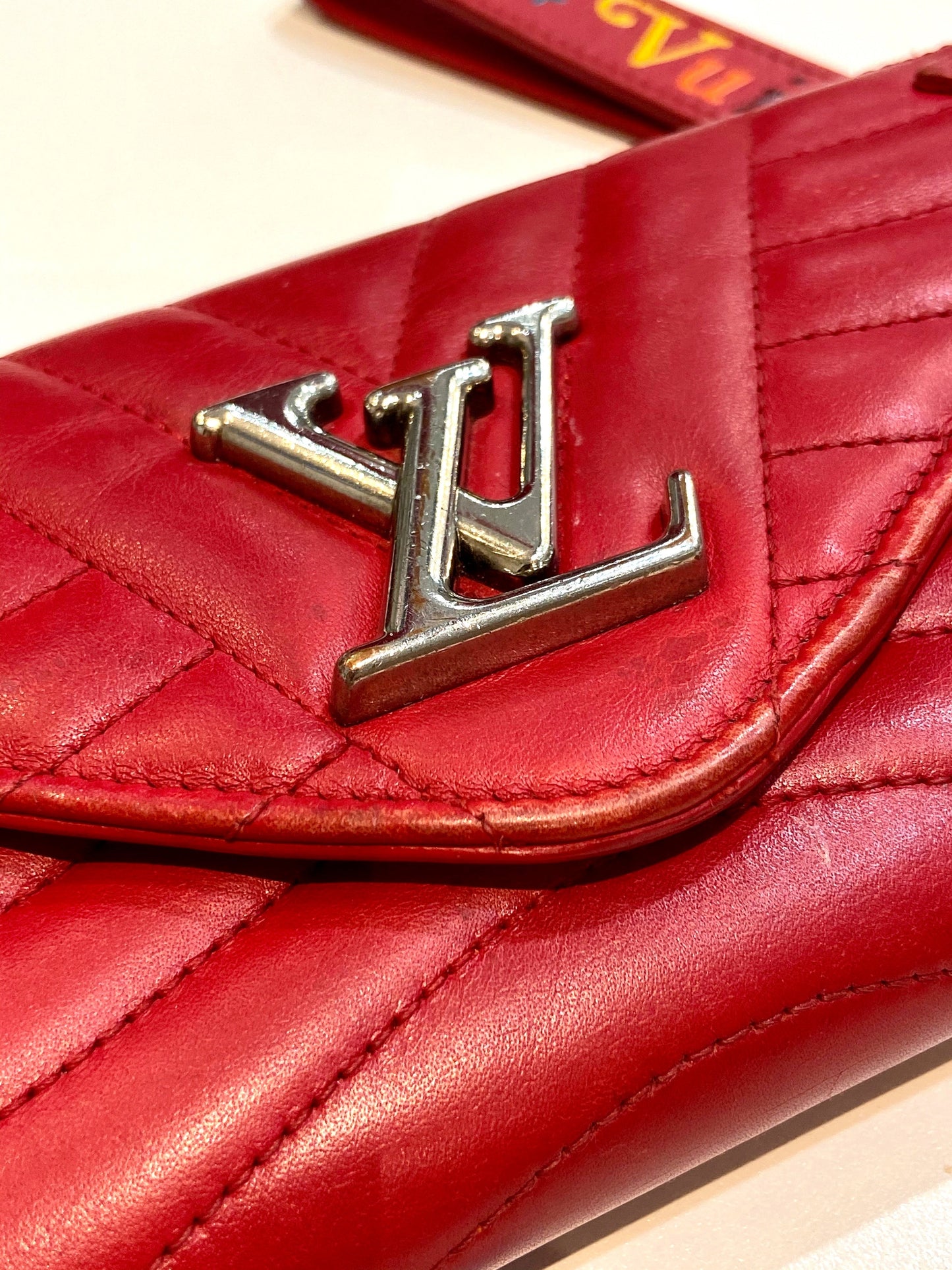LOUIS VUITTON NEW WAVE LONG CALFSKIN WALLET WRISTLET