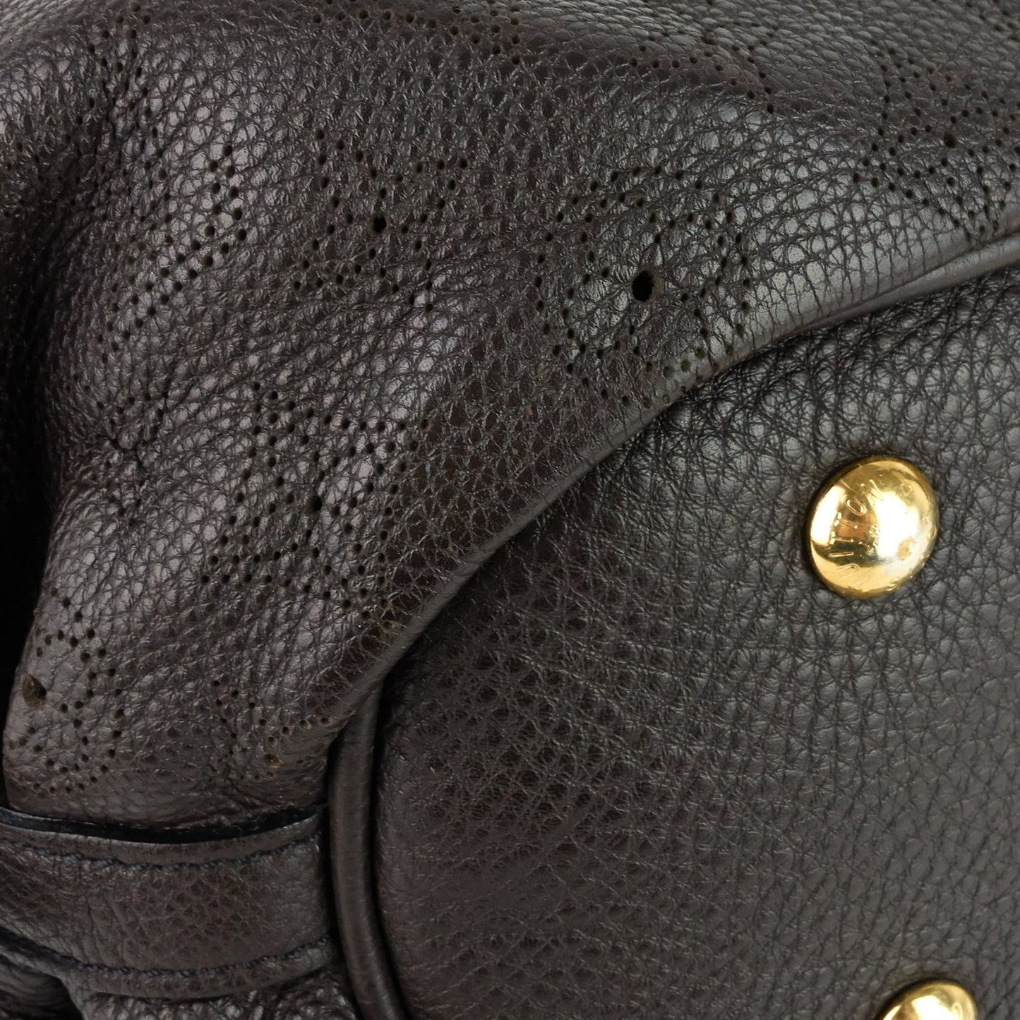 Louis Vuitto Perforated Monogram Mahina Leather XS Bag