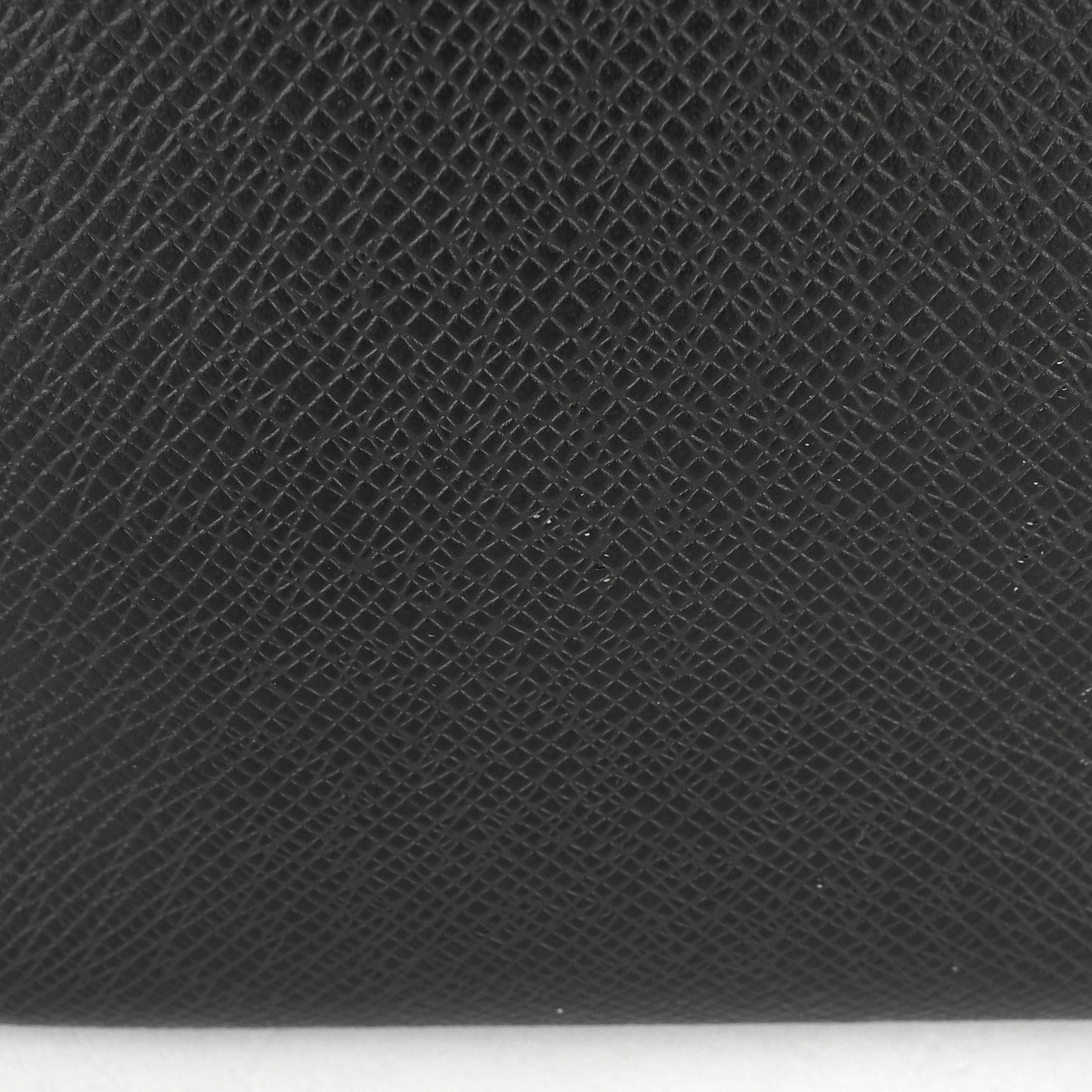 Louis Vuitto Roman MM Taiga Leather Messenger Bag