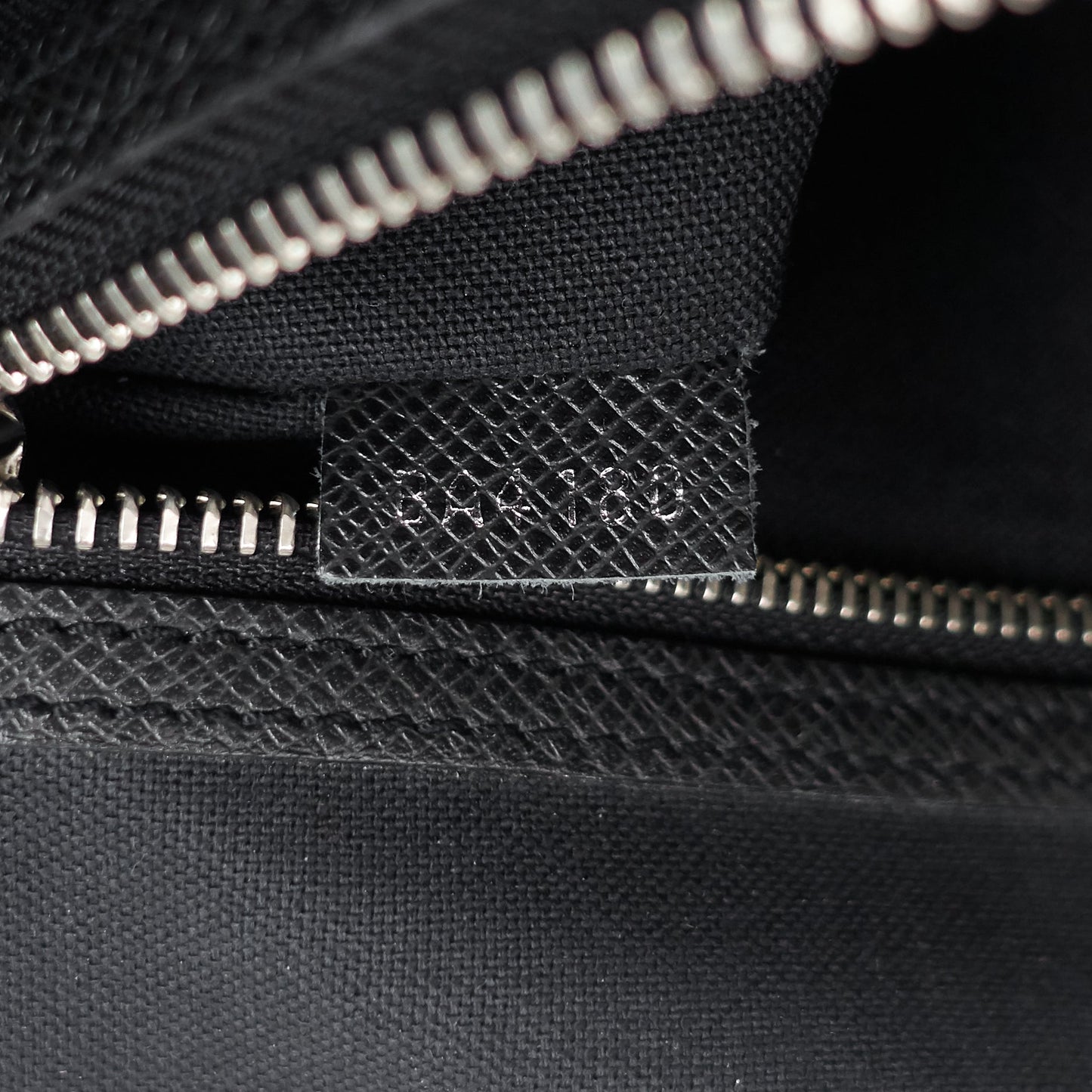 Louis Vuitto Roman MM Taiga Leather Messenger Bag