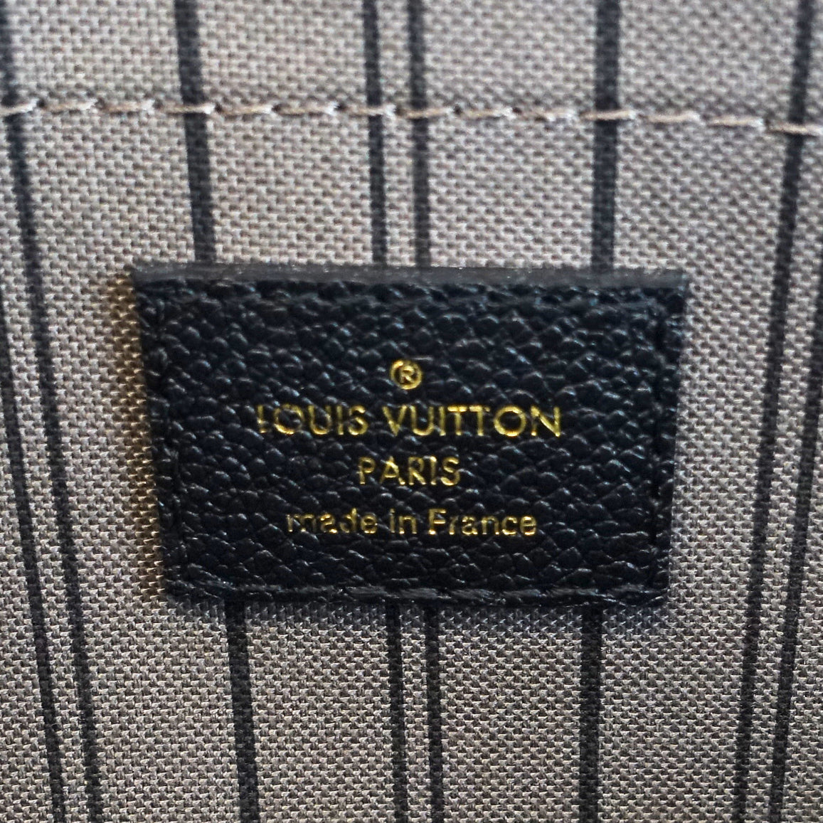 Louis Vuitto Montaigne MM Monogram Empreinte Leather Bag