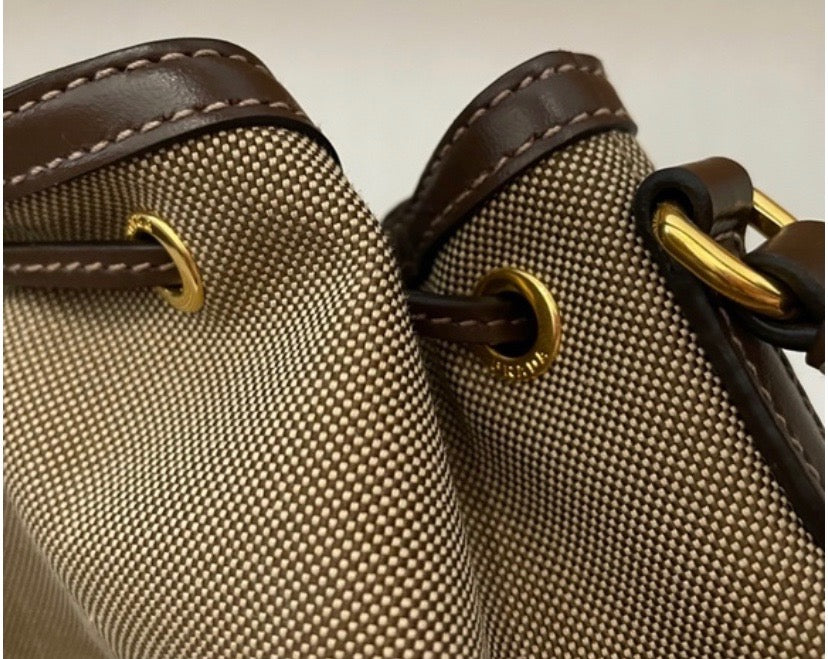 PRADA LOGO JACQUARD CANVAS LEATHER SMALL BUCKET BAG