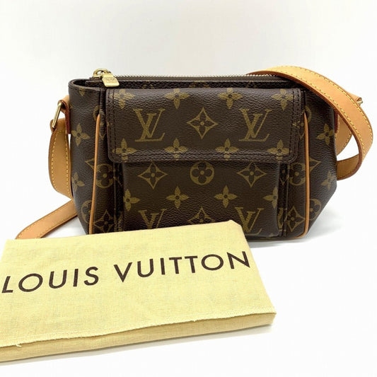 Canvas Luxury Designer Handbag in Good Condition