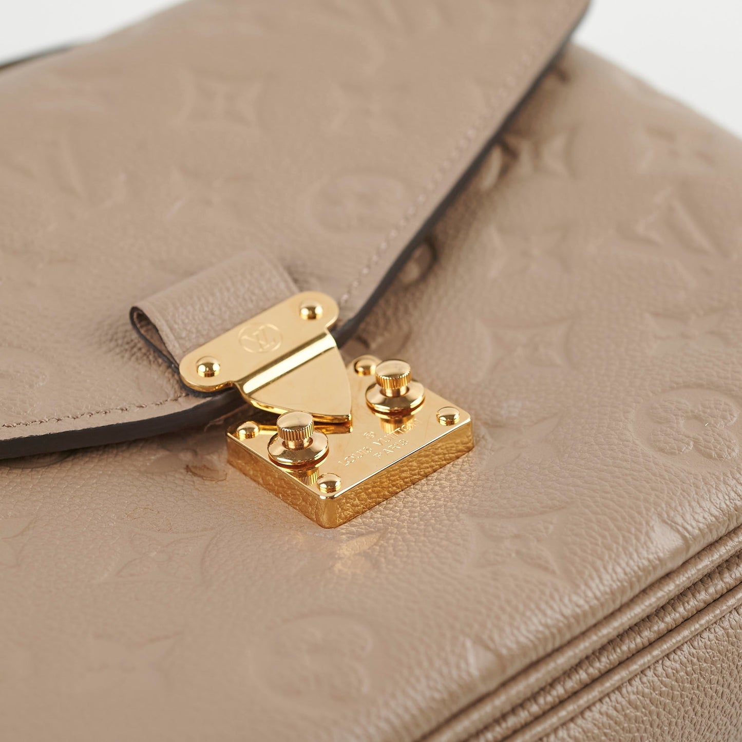 Louis Vuitton Pochette Metis Monogram Empreinte Leather Tourterelle Grey 2024