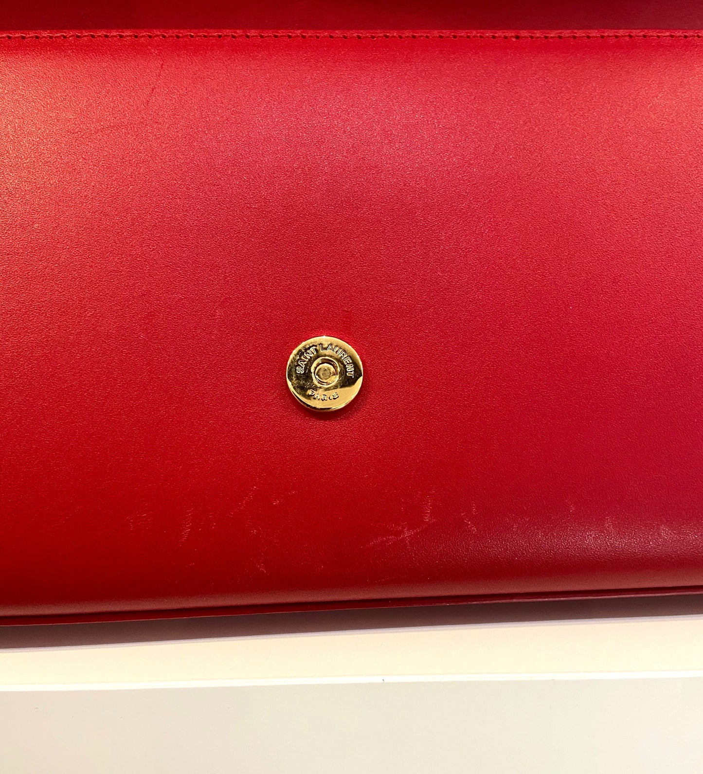YVES SAINT LAURENT KATE LEATHER CLUTCH BAG ROUGE