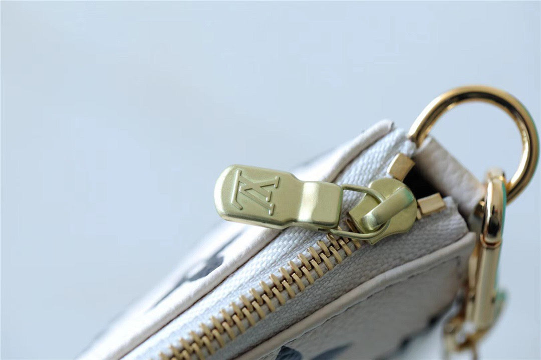 LV Mini Pochette AcGLAMIssoires Monogram Empreinte White For Women, WomenÃ¢â‚¬â„¢s Handbags, Shoulder Bags And Crossbody Bags 6.1in/15.5cm LVÃ‚Â 