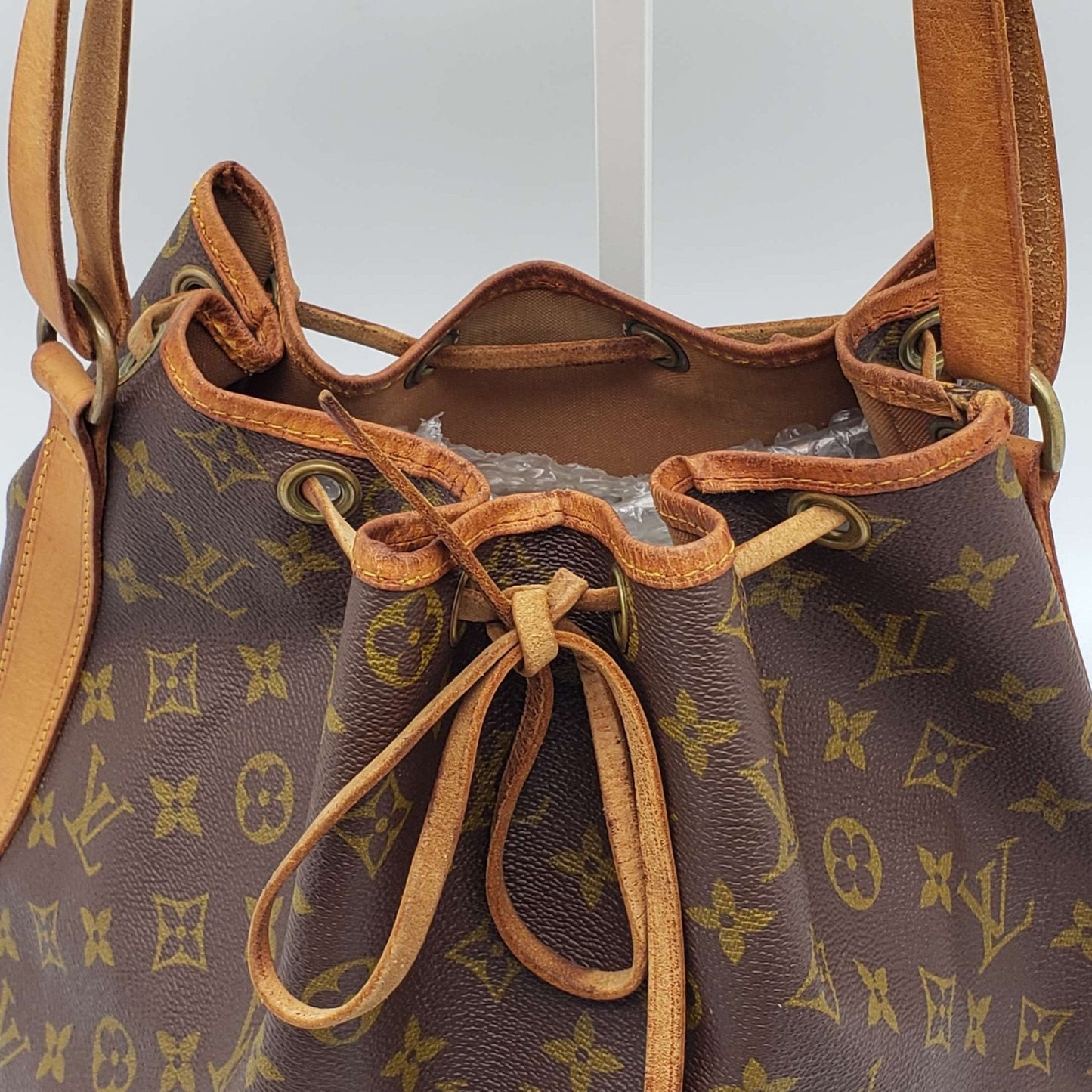 LOUIS VUITTON MONOGRAM PETIT NOE DRAWSTRING BAG