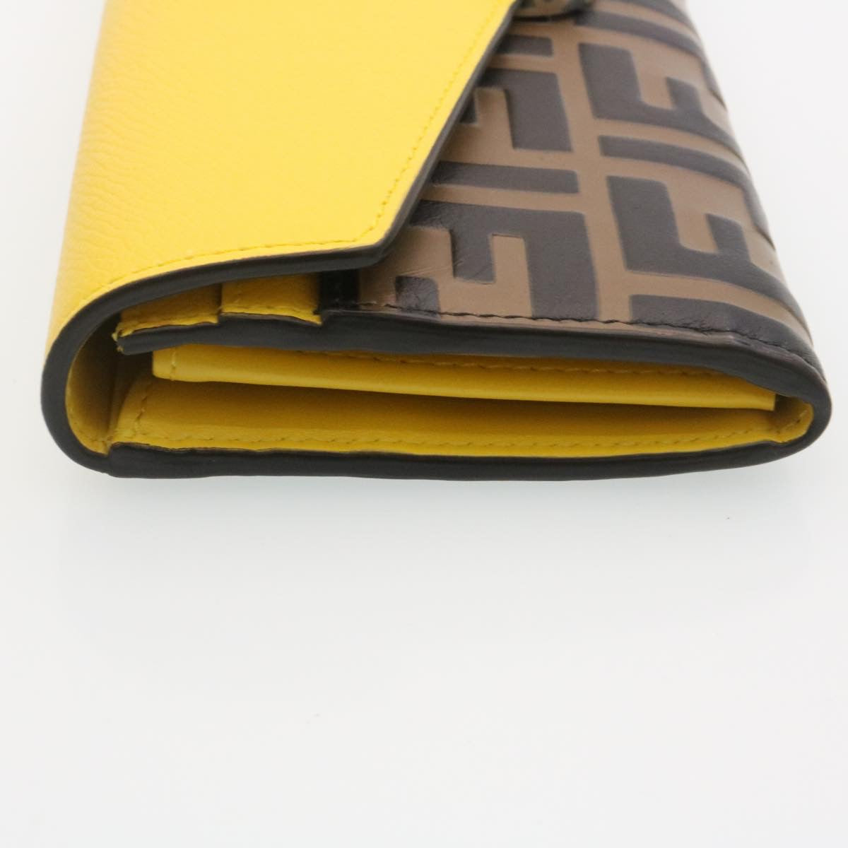 FENDI Zucca F is Continental Wallet Embossed Leather Yellow Brown 34531