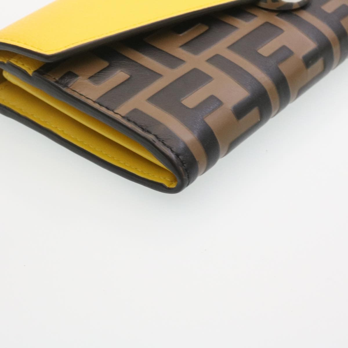 FENDI Zucca F is Continental Wallet Embossed Leather Yellow Brown 34531