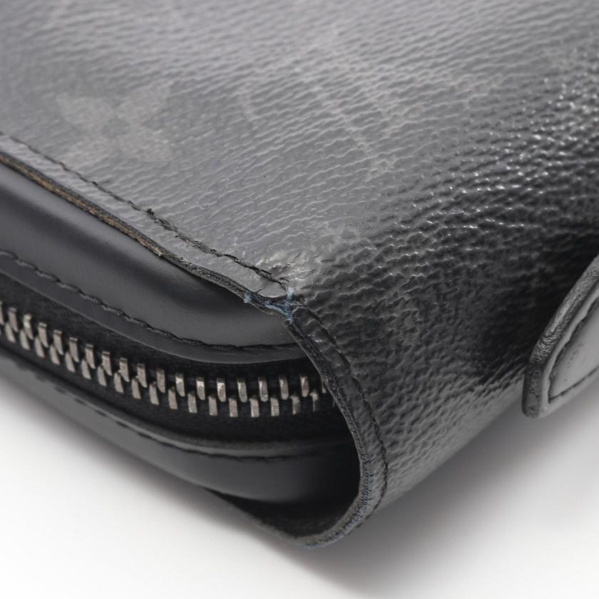 Pre-loved GLM-Zippy XL Monogram Eclipse round zipper long wallet PVC leather black - Condition B 2107601077672